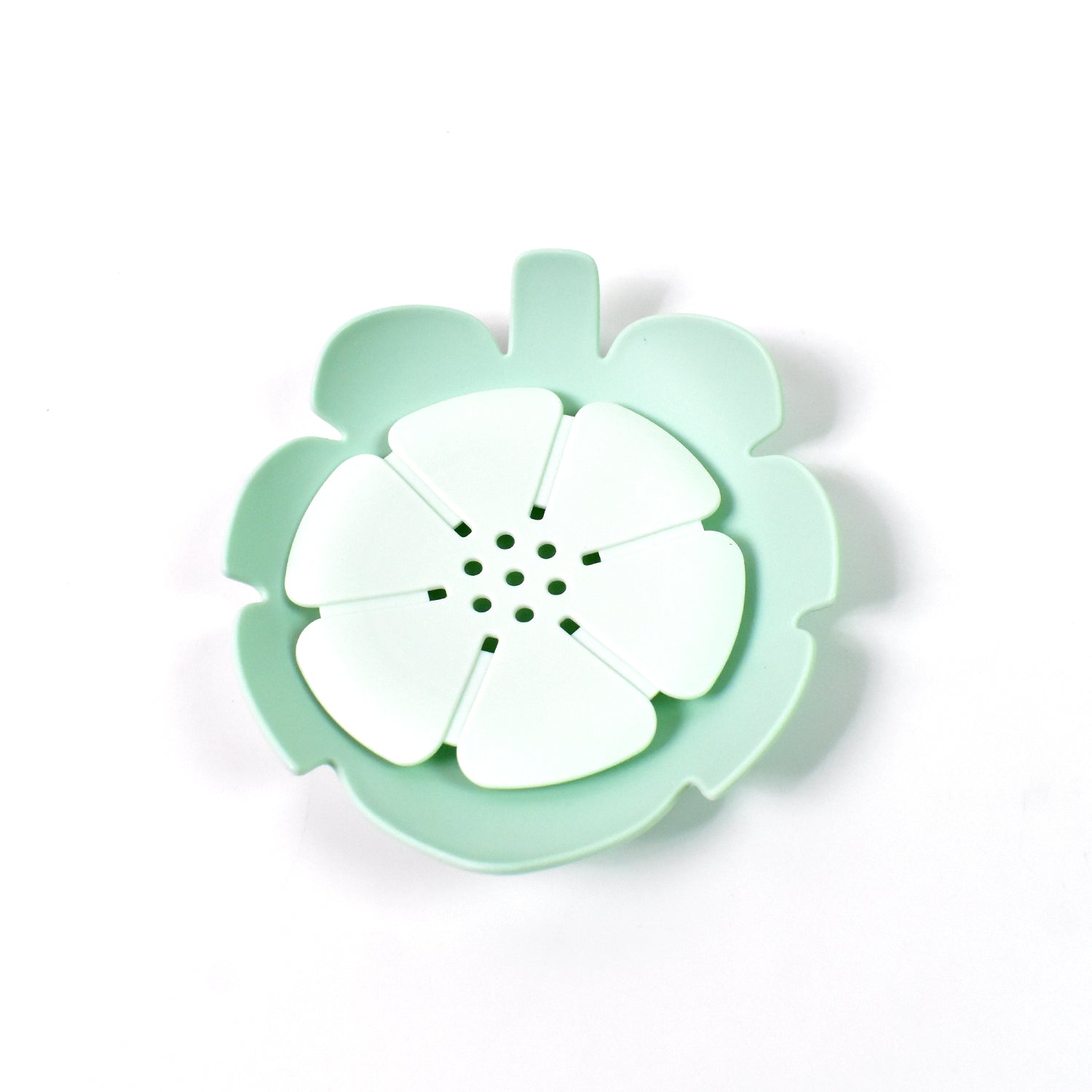 Plastic soap dish with unique lotus flower design, ideal for keeping soap dry.