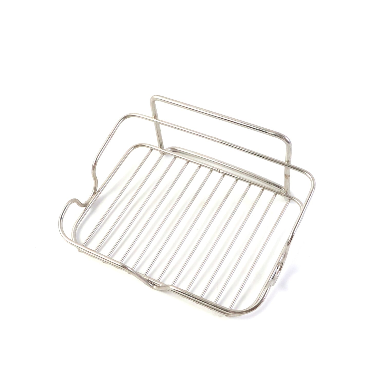 Elevated stainless steel soap stand holding bathroom essentials securely