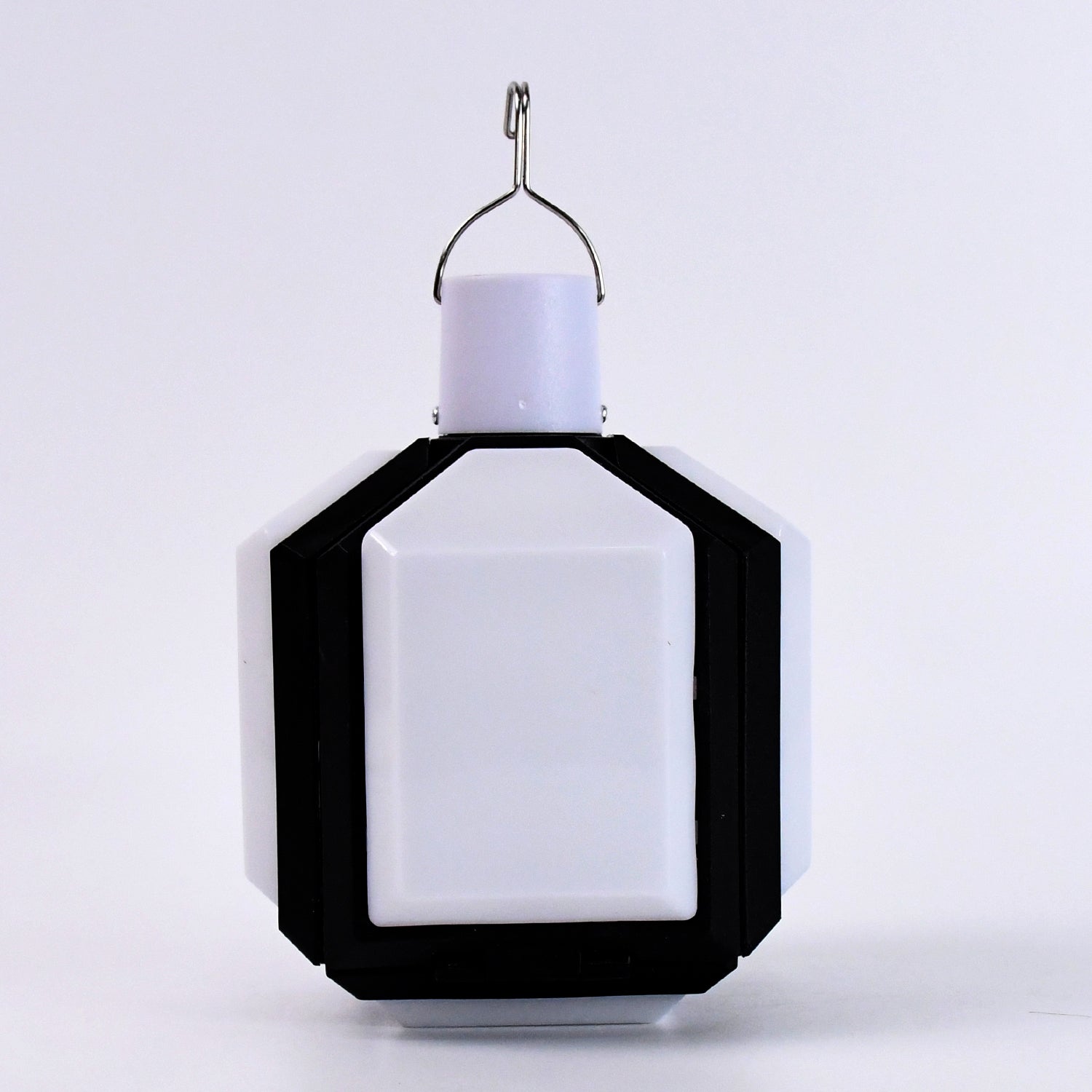 Portable camping LED light shown folded for easy travel and storage