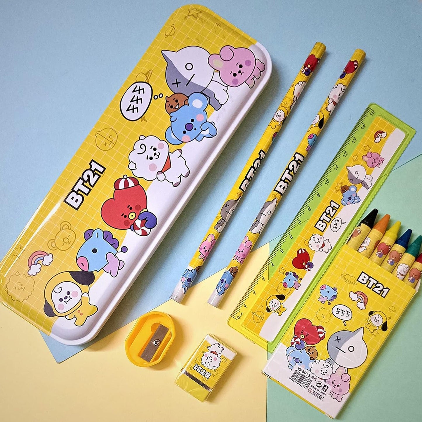 Overhead view of the 12-piece school supply kit for kids, including sharpener and pencil.