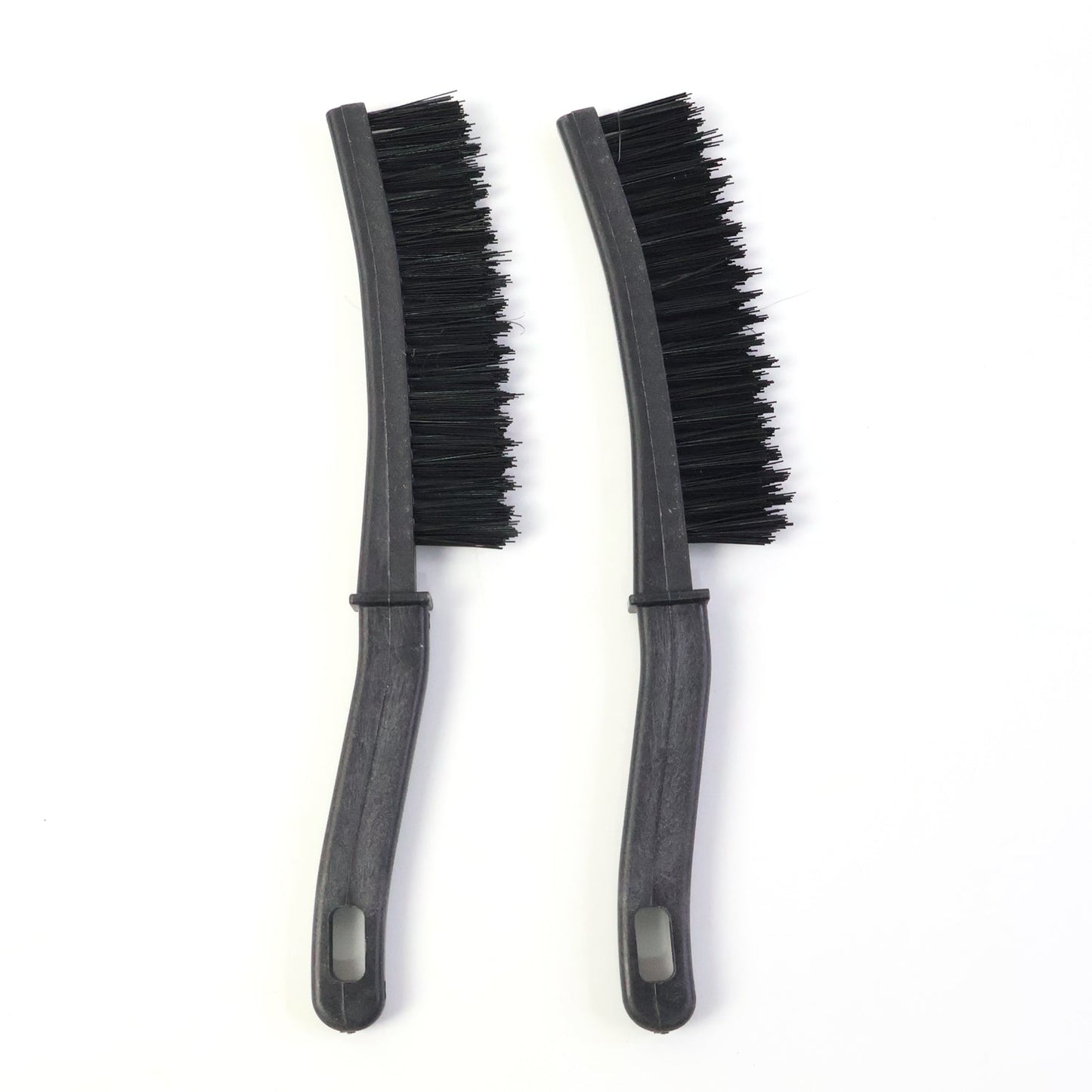 Durable plastic handled stiff bristle brush for scrubbing corner grout lines