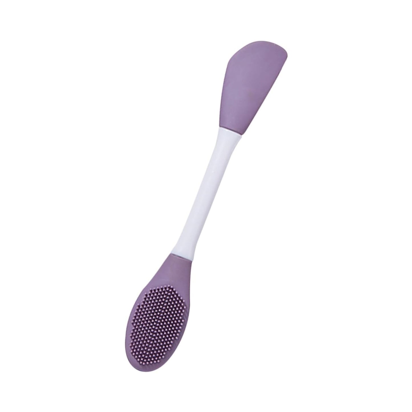 The versatile silicone mask brush shown applying a green clay mask to a face.