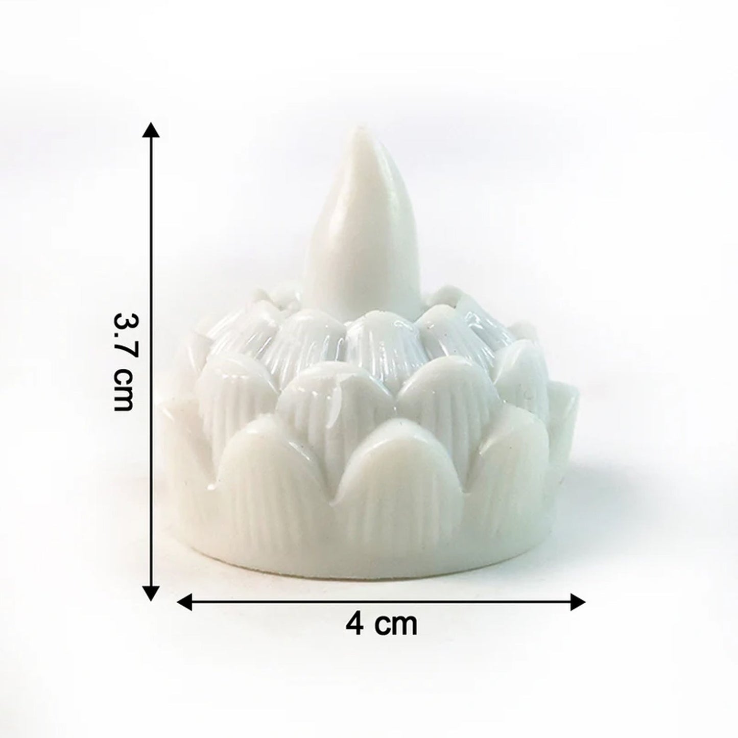 Decorative lotus designed LED tealight candles glowing warmly in dark