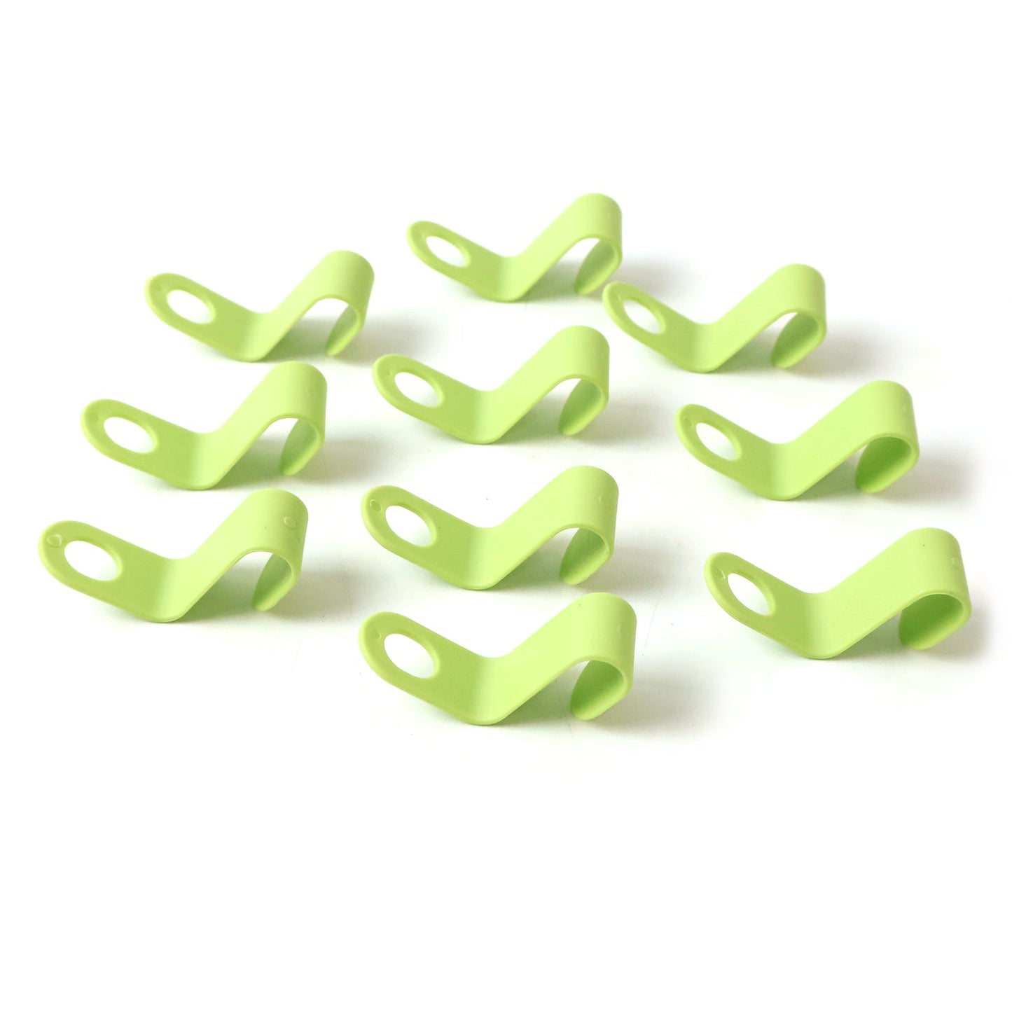 Everyday use of plastic hanger hooks in an organized closet