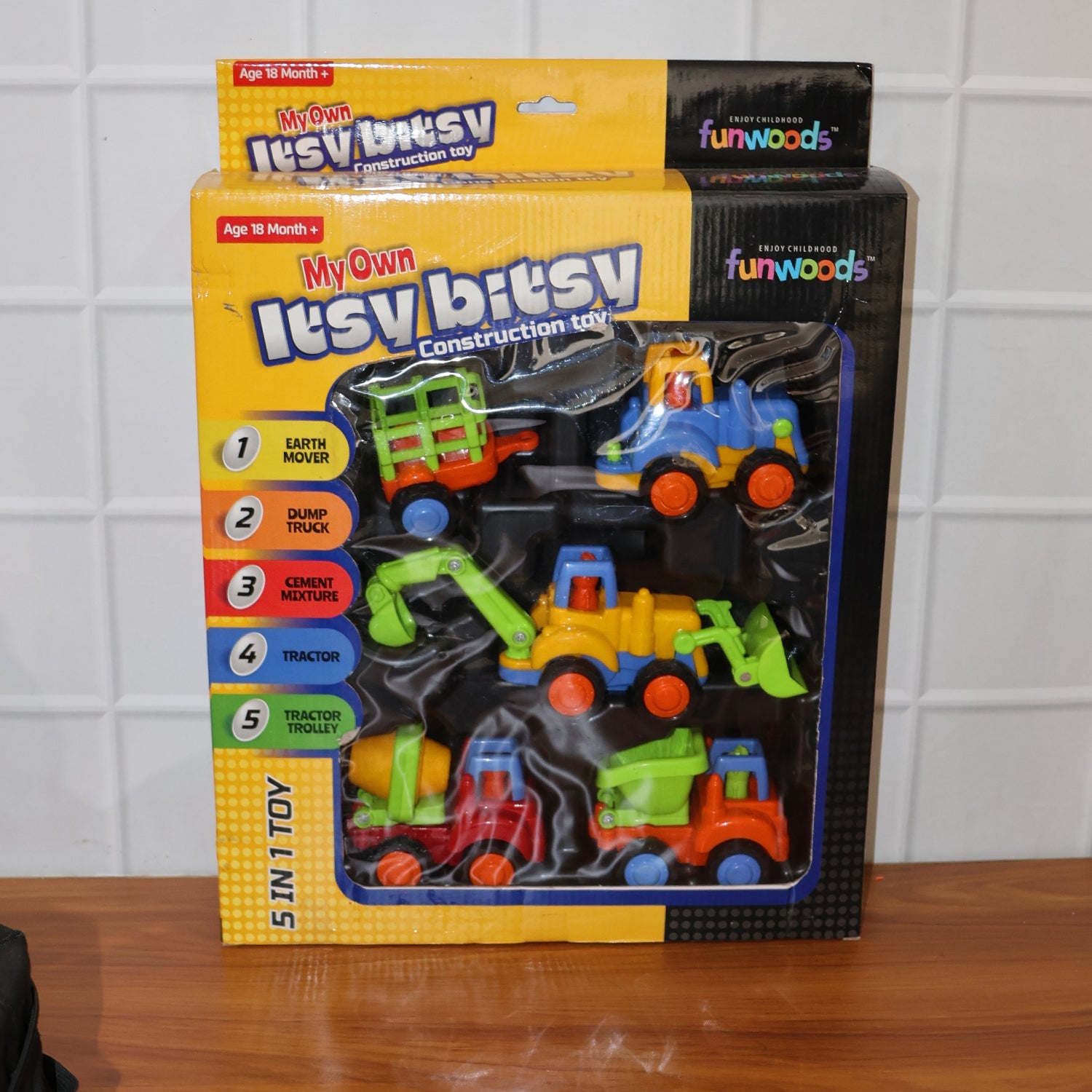 Colorful construction vehicle toys arranged for child's playtime