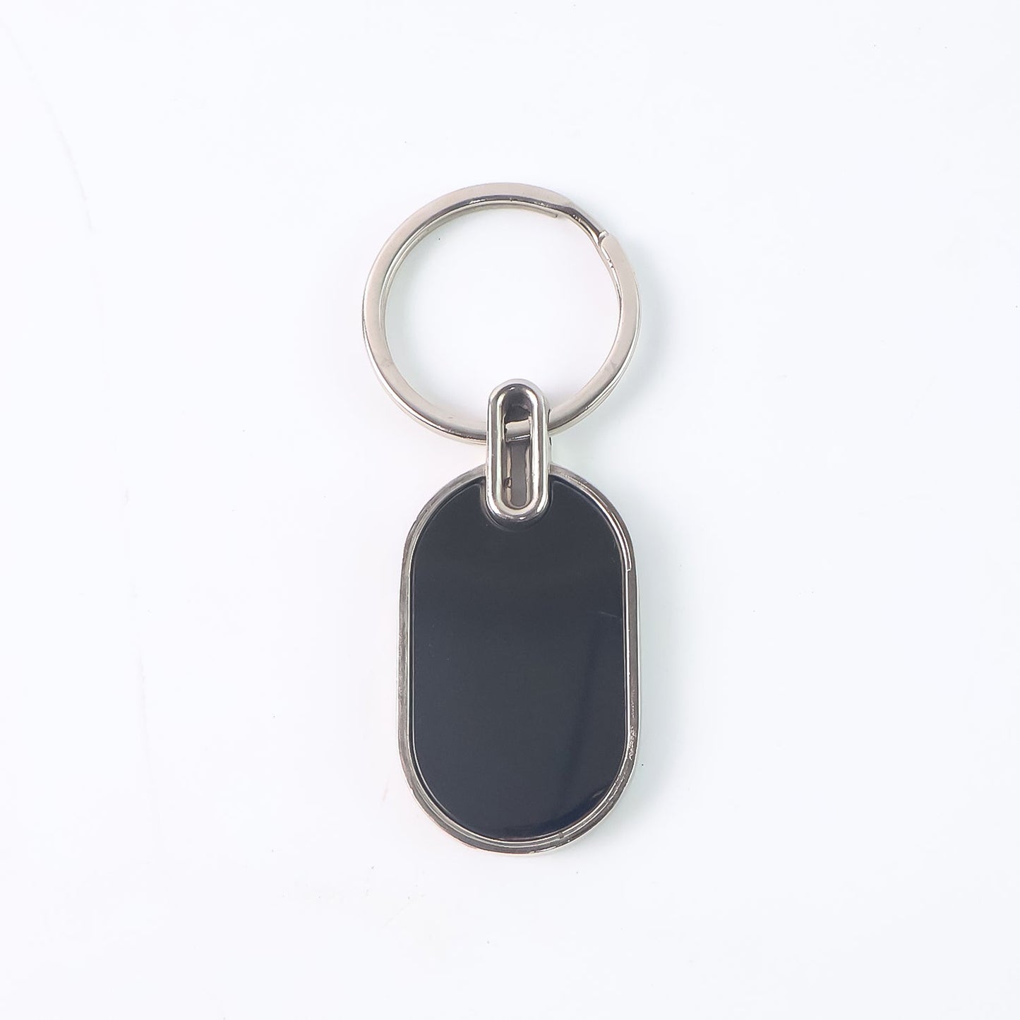 Monogram edge silver and black oval metal key holder accessory