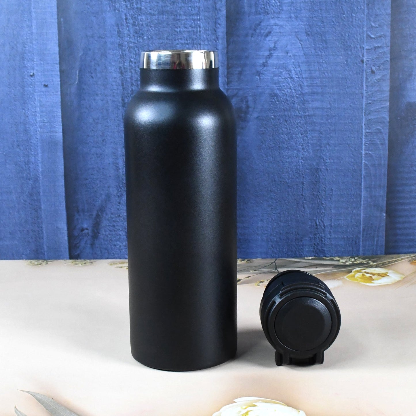 Vacuum insulated kids water bottle with stainless steel finish and colorful print