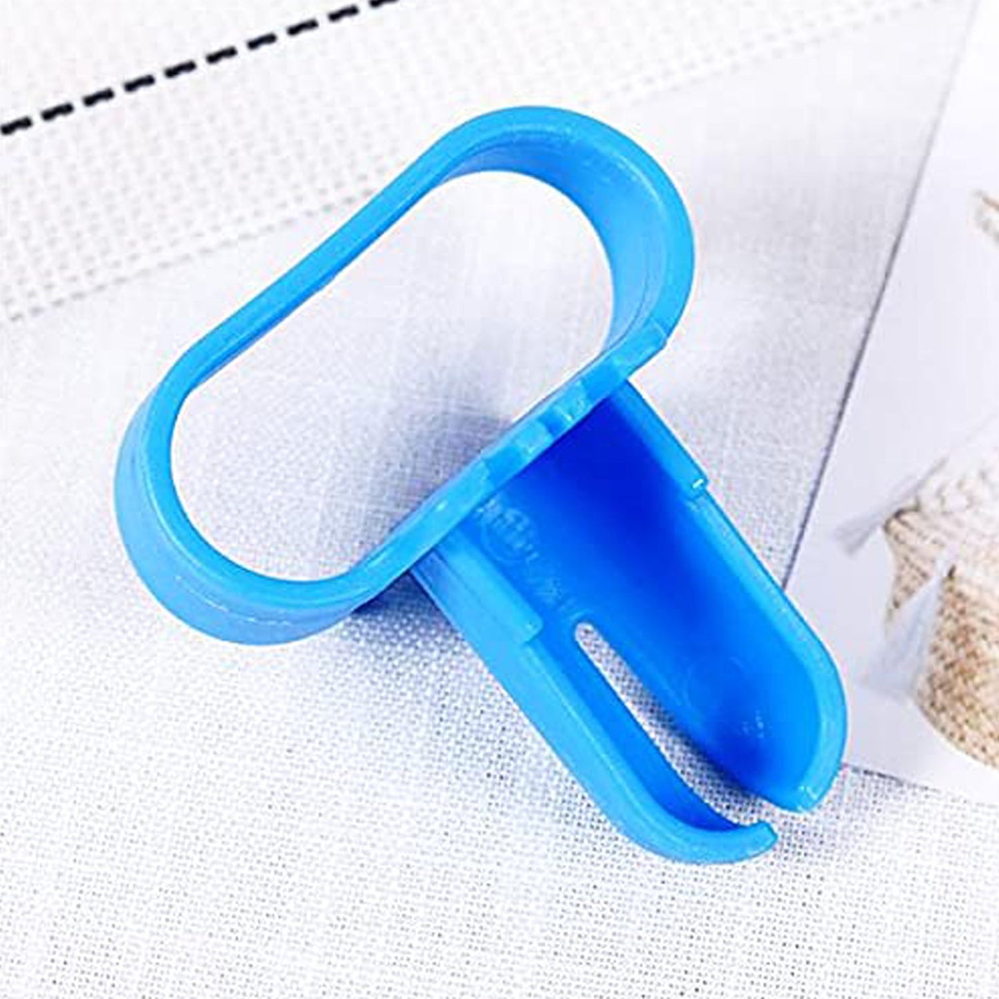 Ergonomic Balloon Tying Tool for quick and easy knotting at parties and events.