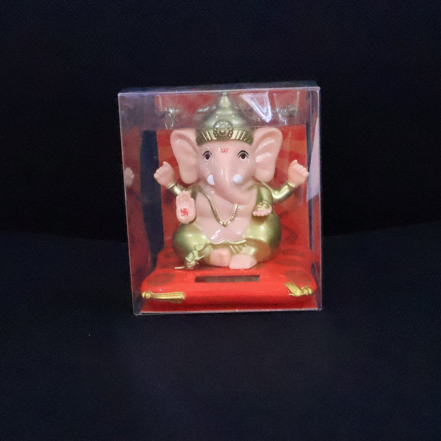 Medium Lord Ganesh Idol with softly glowing solar base amidst peaceful decor
