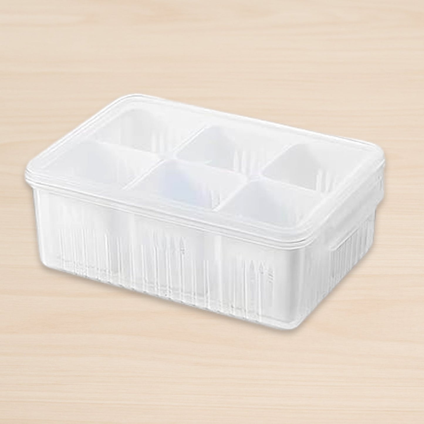 Empty clear plastic fridge storage box ready for organizing food items.
