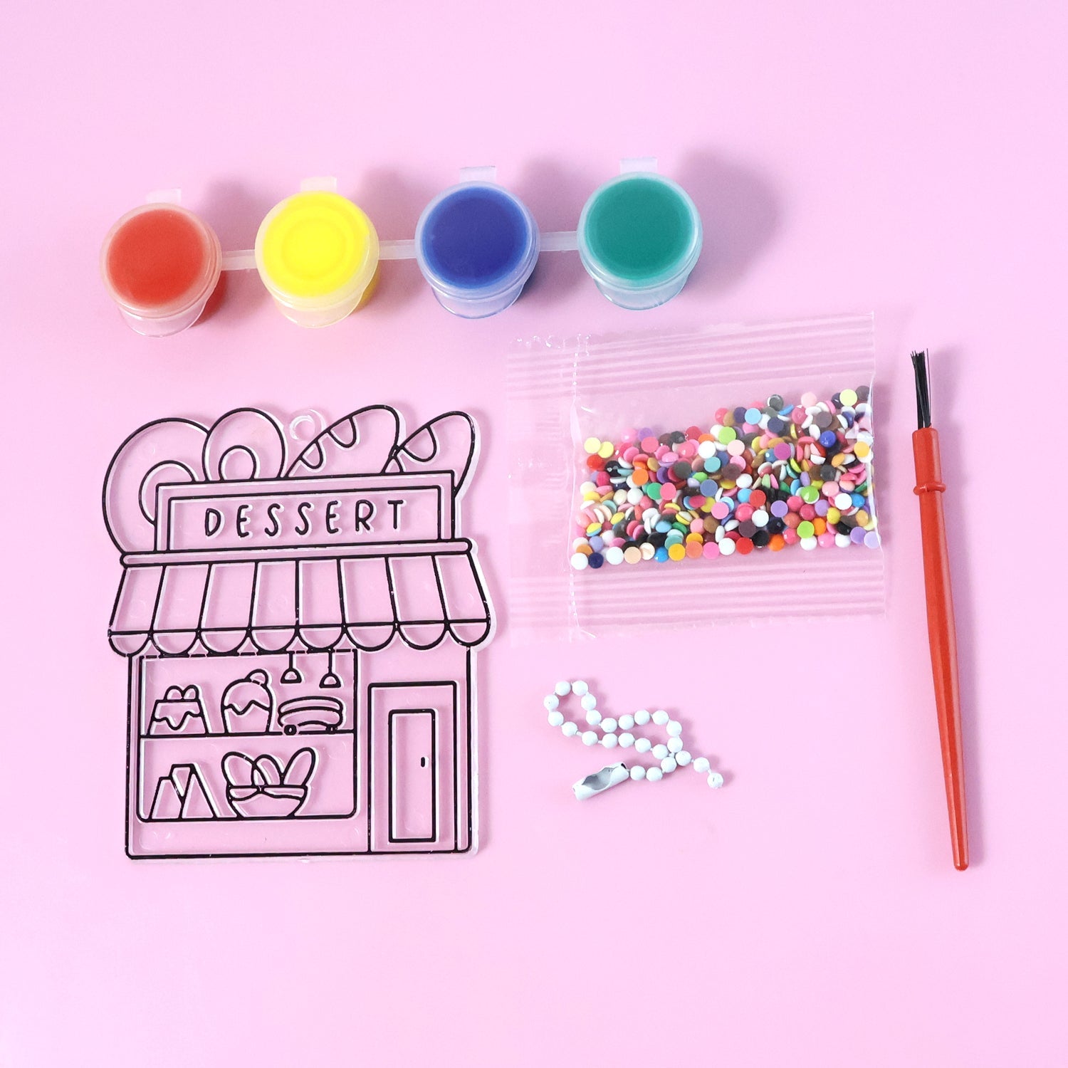 Kids painting craft activity set with colorful paint pots and beads