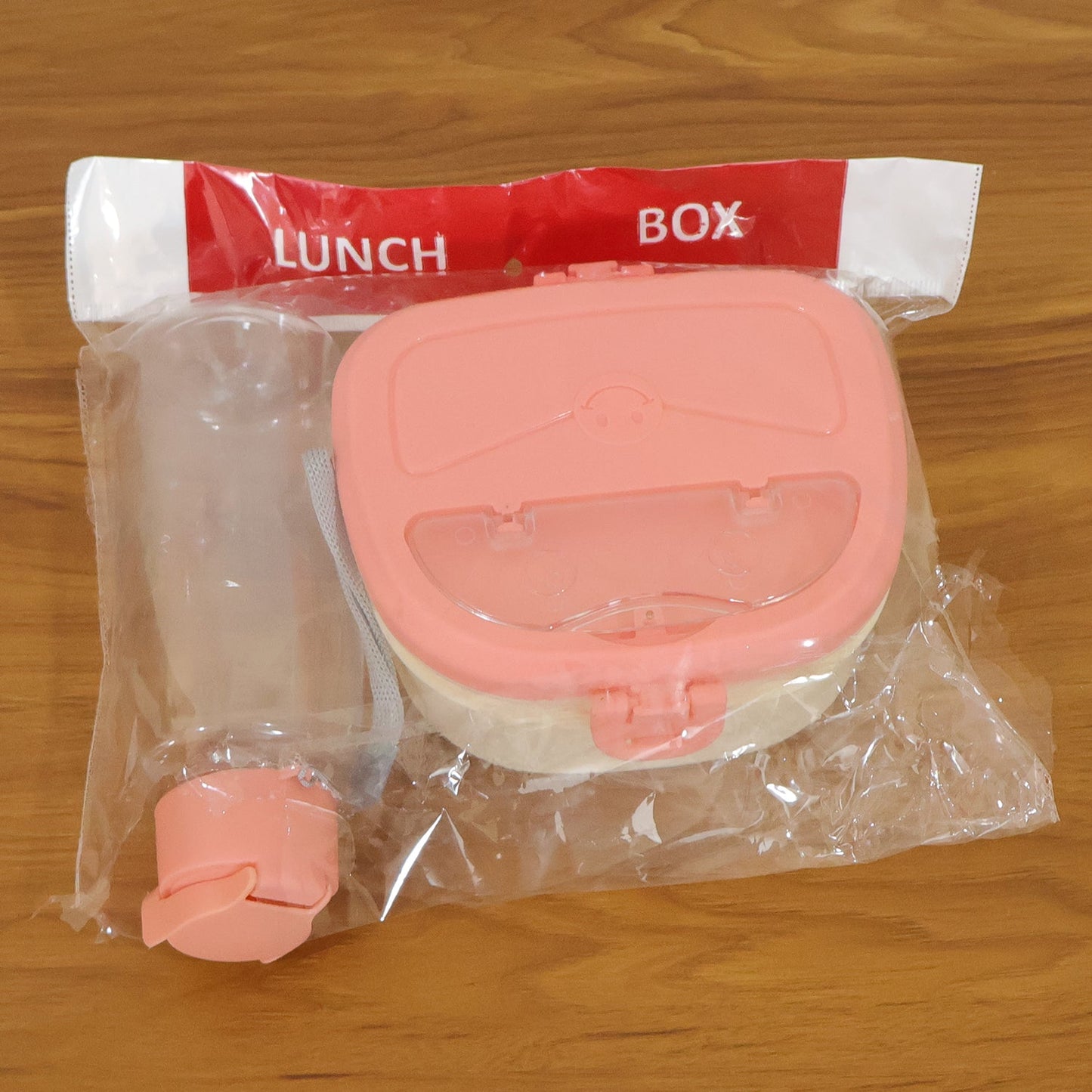 Compact plastic lunch box set with secure lid and water bottle