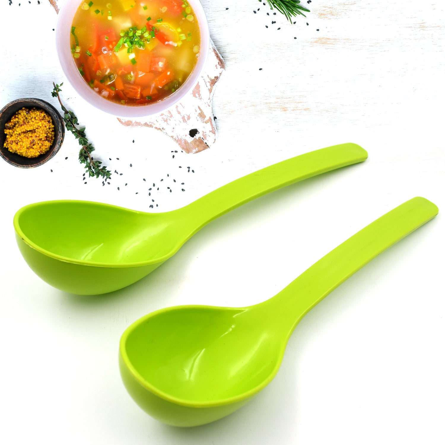 Close-up of the ergonomic handle of a black plastic serving spoon, highlighting comfort.