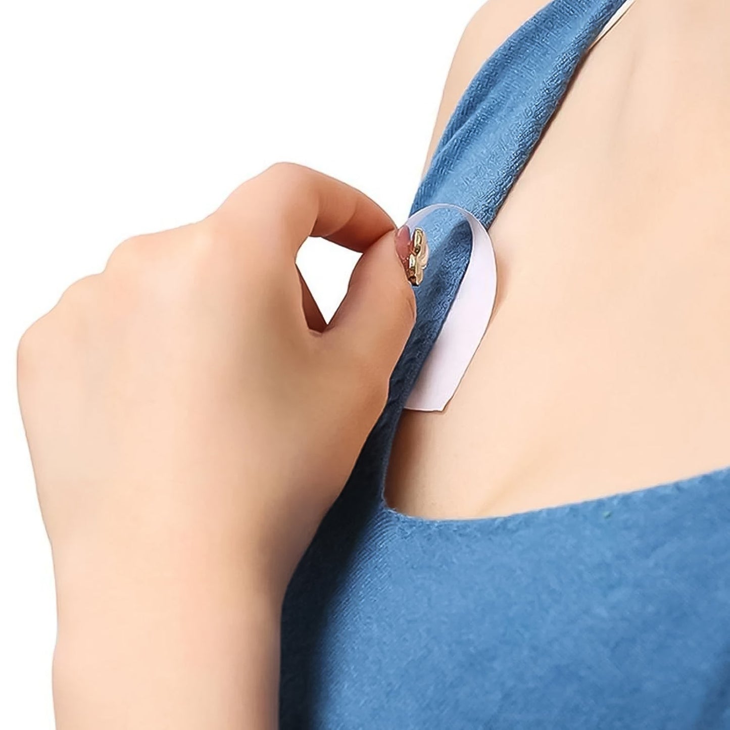 Fashion tape used to secure the neckline of a deep plunge dress.