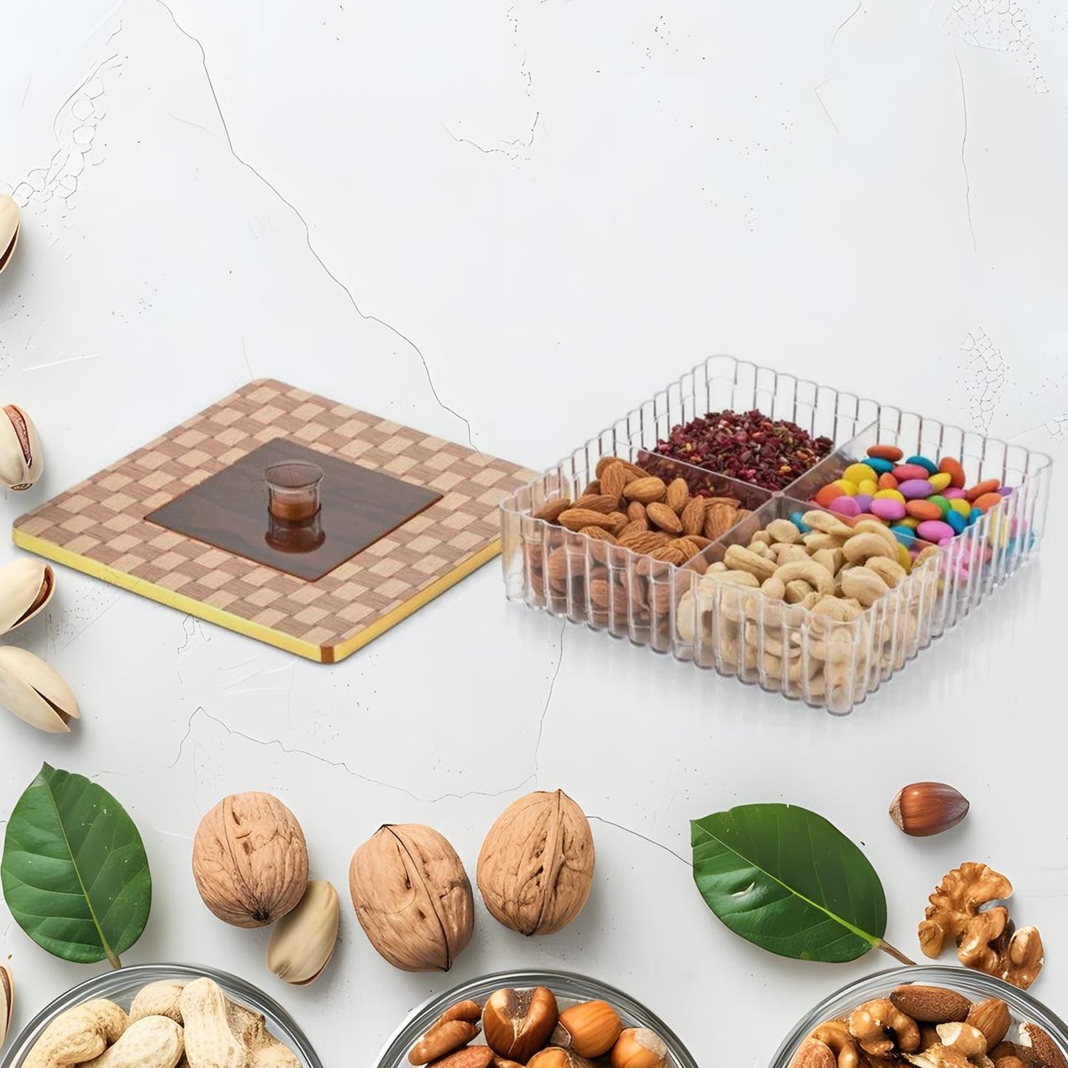 Transparent plastic dry fruit box showcasing its four spacious sections.