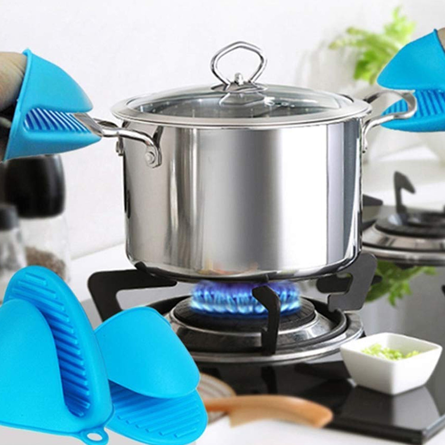 Ergonomic silicone heat resistant potholder in use, gripping a hot pan safely.