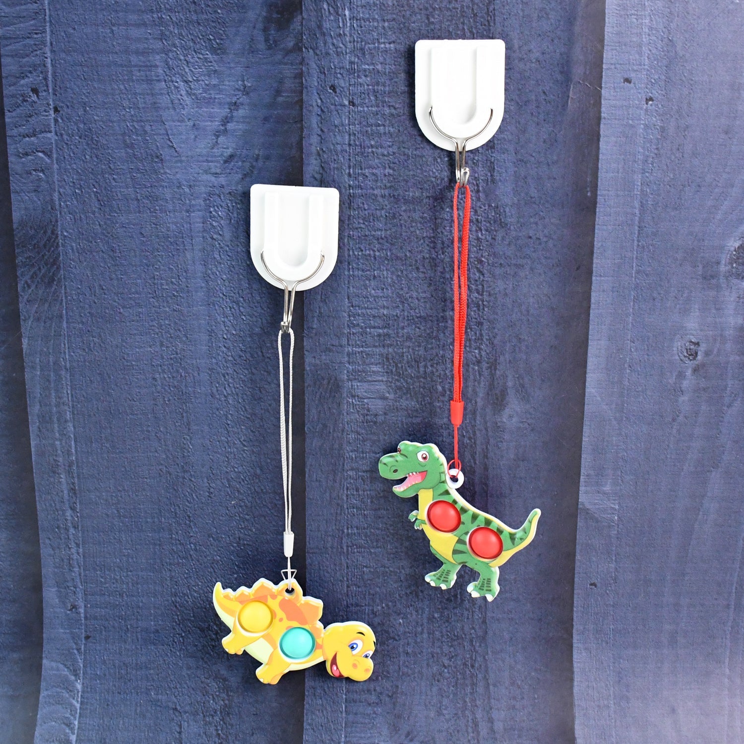 Kitchen scene with a stainless steel adhesive hook neatly holding a cooking utensil.