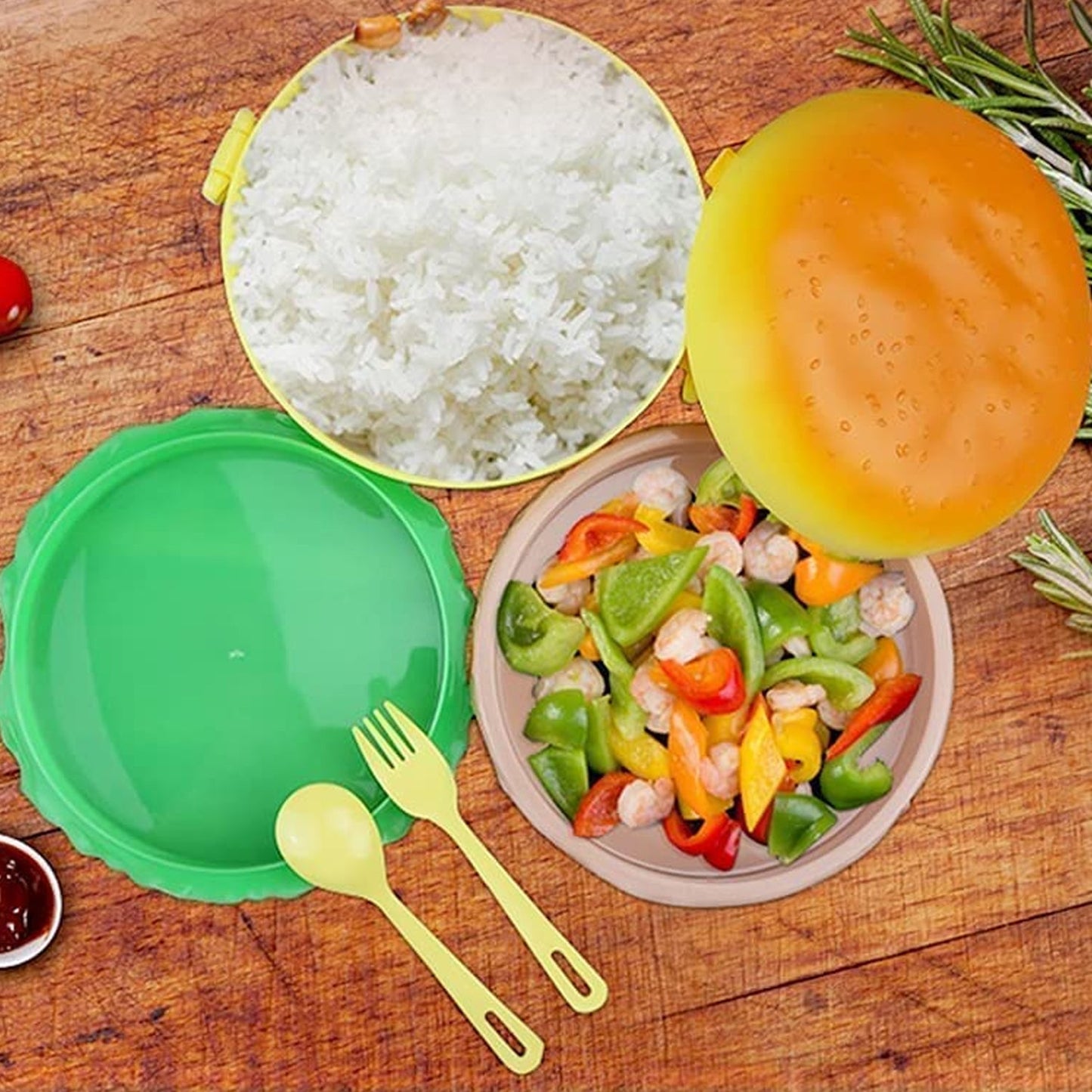 A vibrant burger shape lunch box filled with a balanced meal for kids.