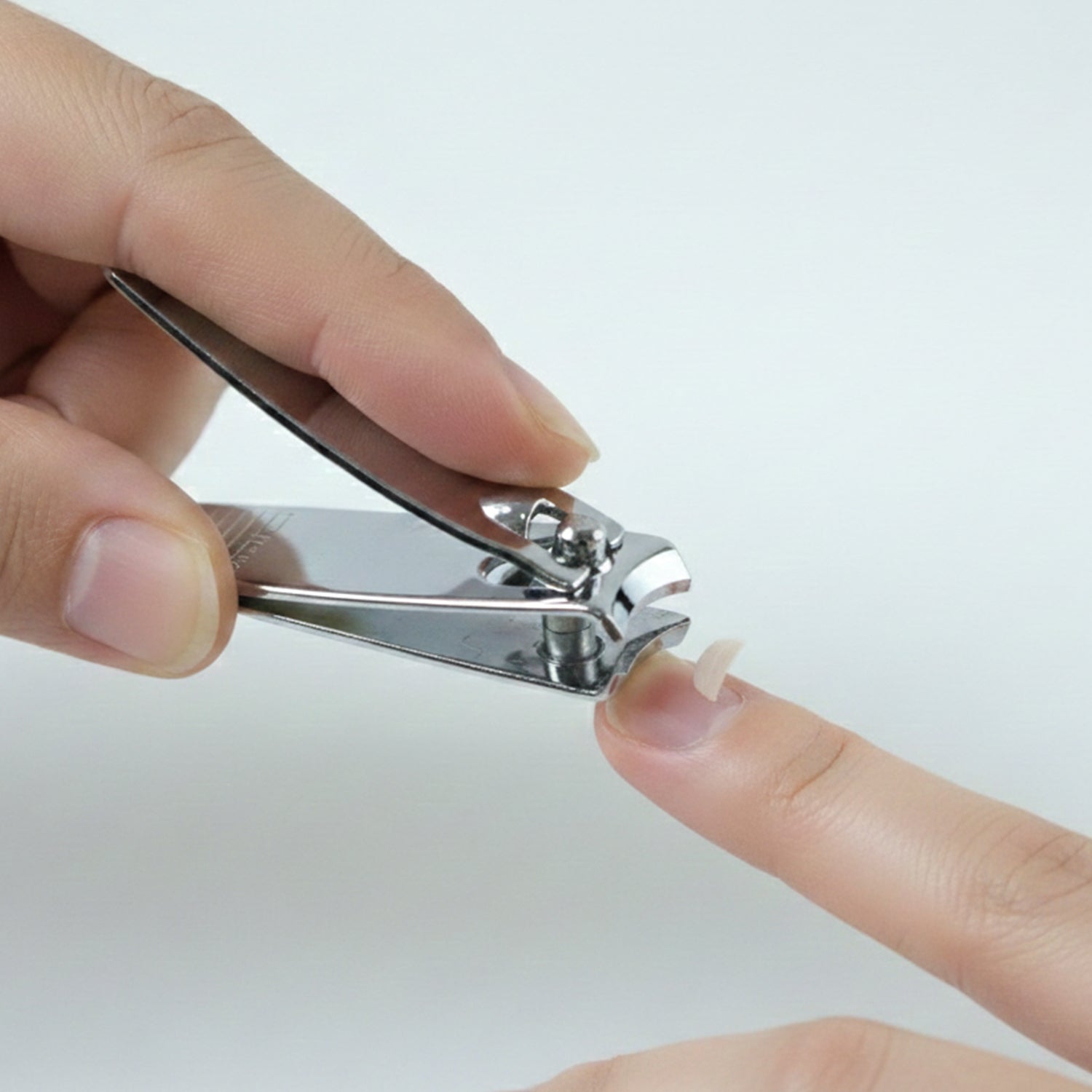 Nail care kit with file, scissors, and tweezers