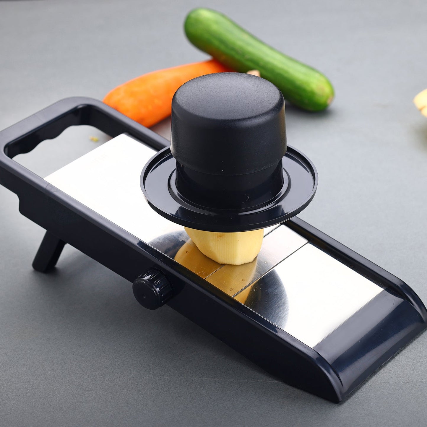 Adjustable potato and onion slicer demonstrating its compact size and efficiency.