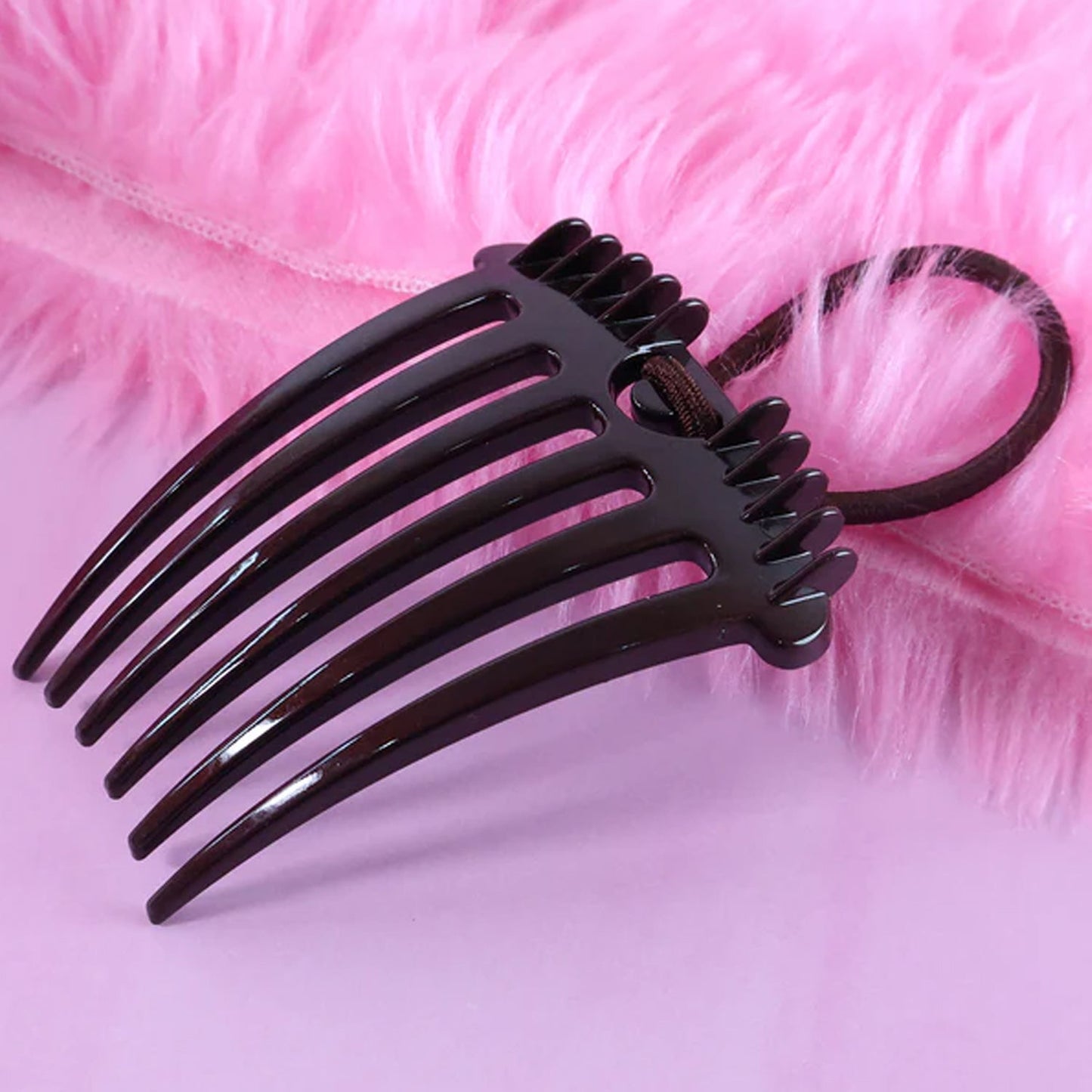Volumizing hair comb clip used for enhancing hair volume and buns