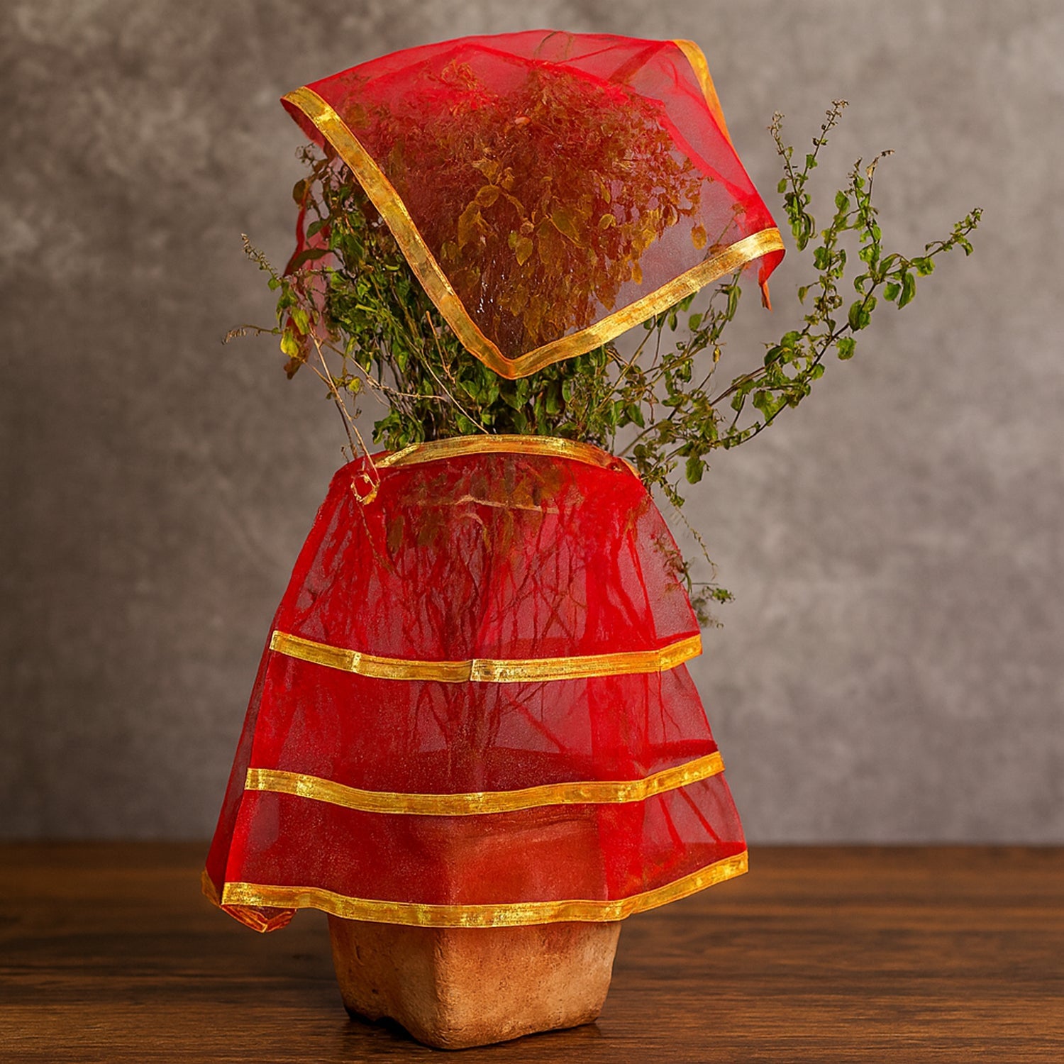 Two-piece tulsi vastra pooja cloth set in vibrant red and gold garment for rituals