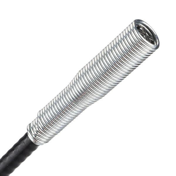 Stainless steel drain cleaning brush coiled for compact storage.