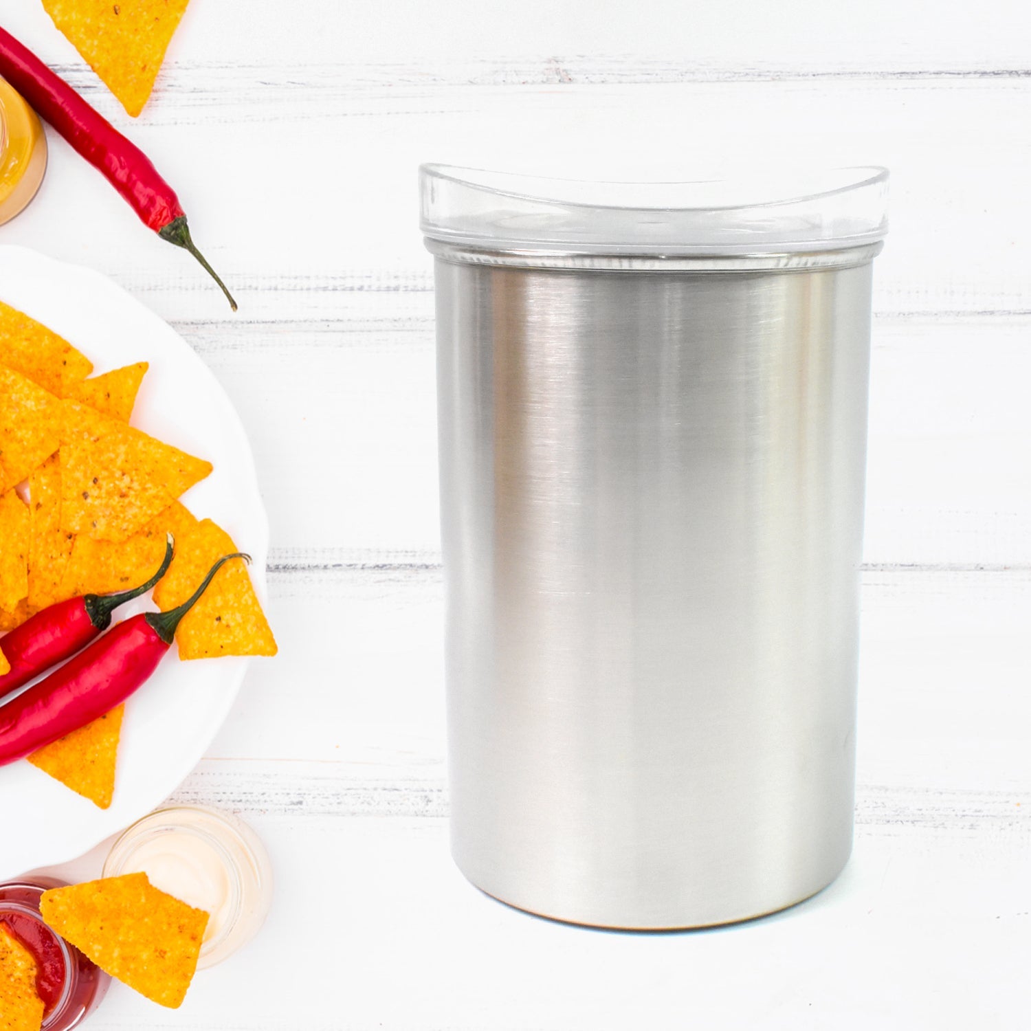 Close-up of the airtight plastic lid on a Konvex stainless steel food container.