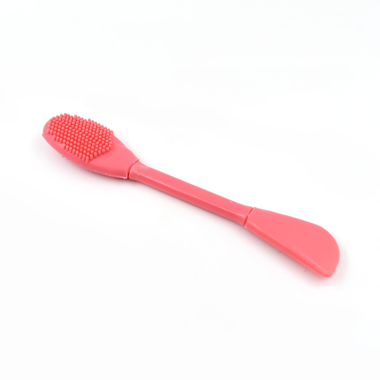 Ergonomic silicone face mask applicator for comfortable and controlled skincare application.