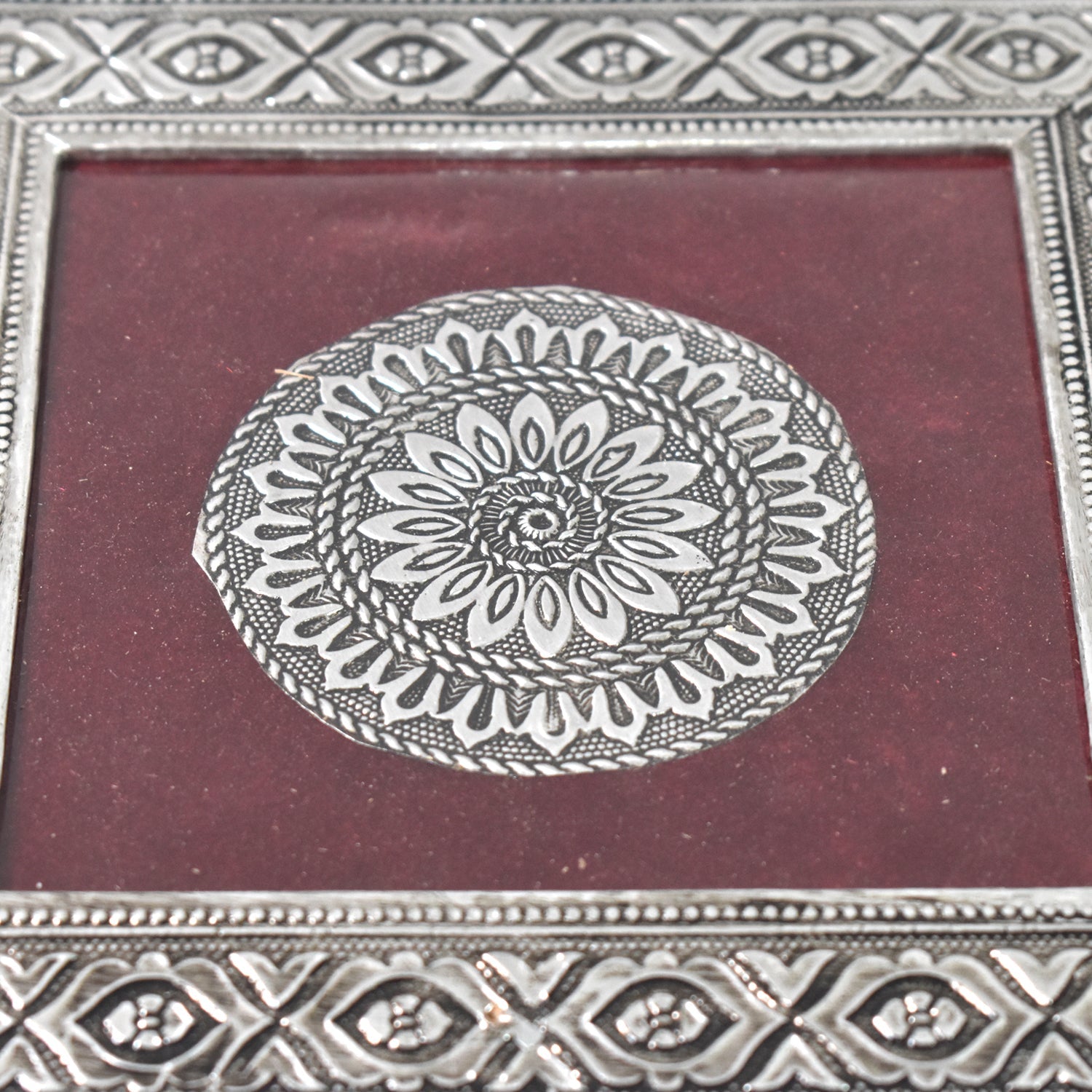Top view of the silver pooja chowki, showcasing its exquisite mandala pattern and finish.