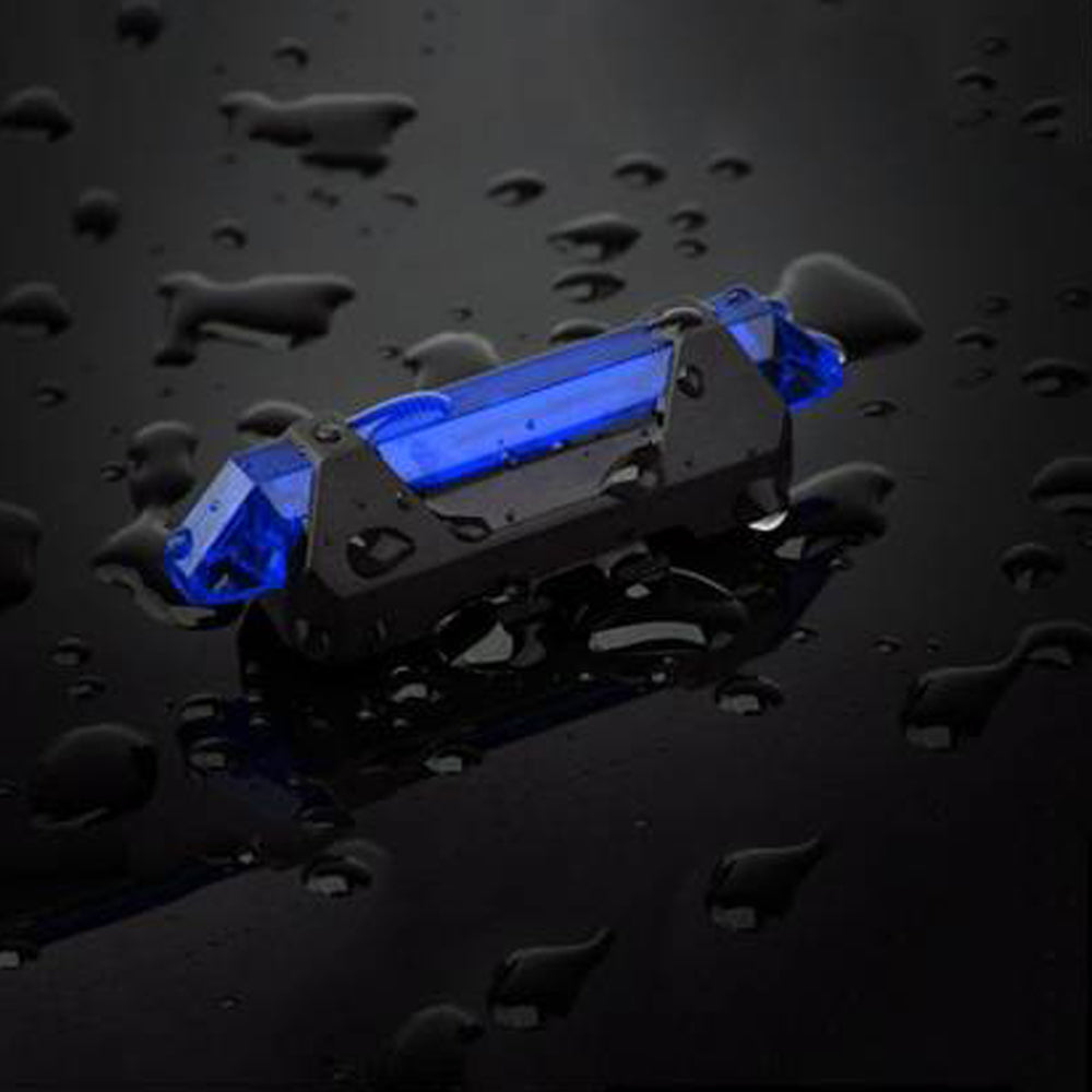 Packaging for the blue rechargeable bicycle light, including the light, USB cable, and rubber band.