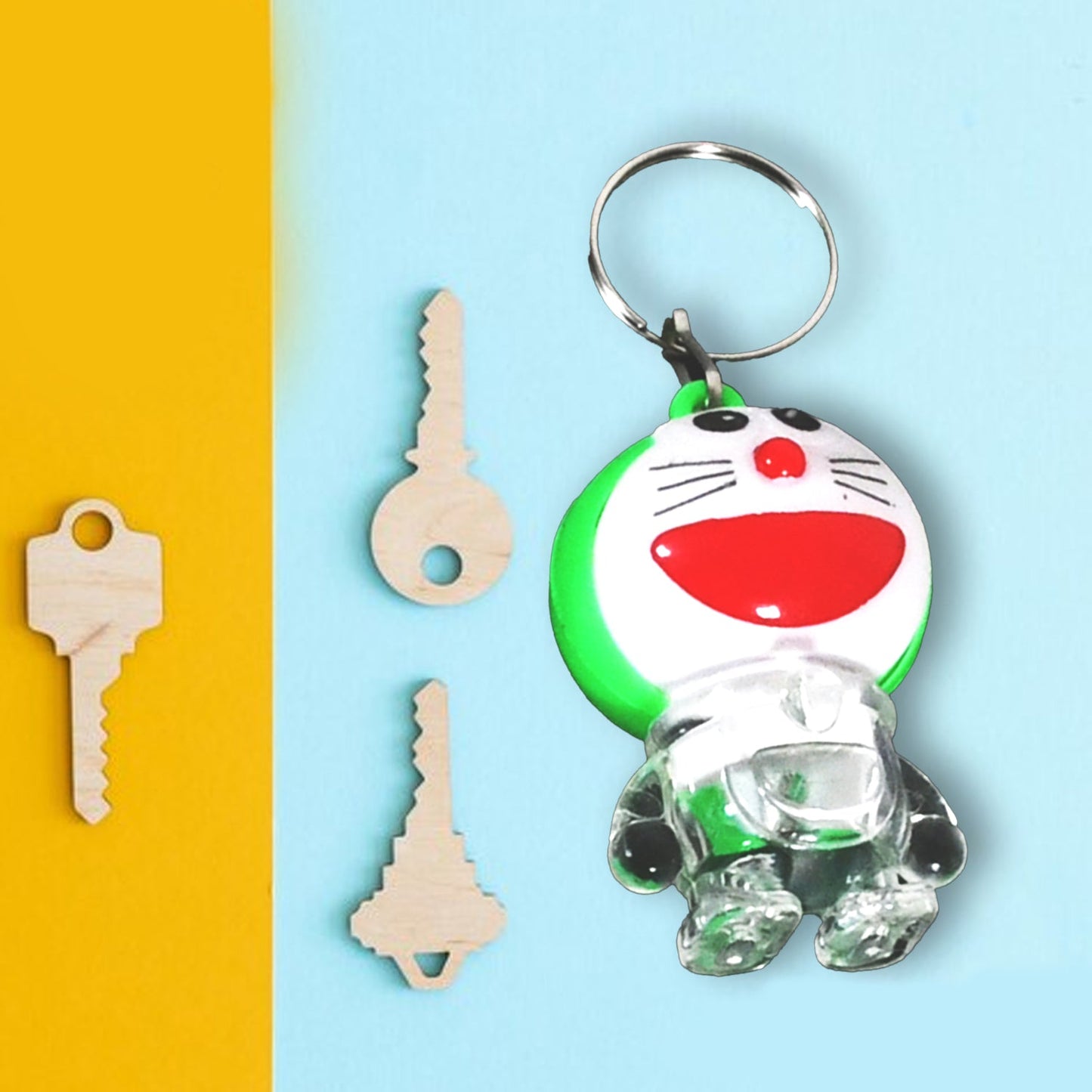 Doremon keychain held in hand, showing its compact size and vibrant look.