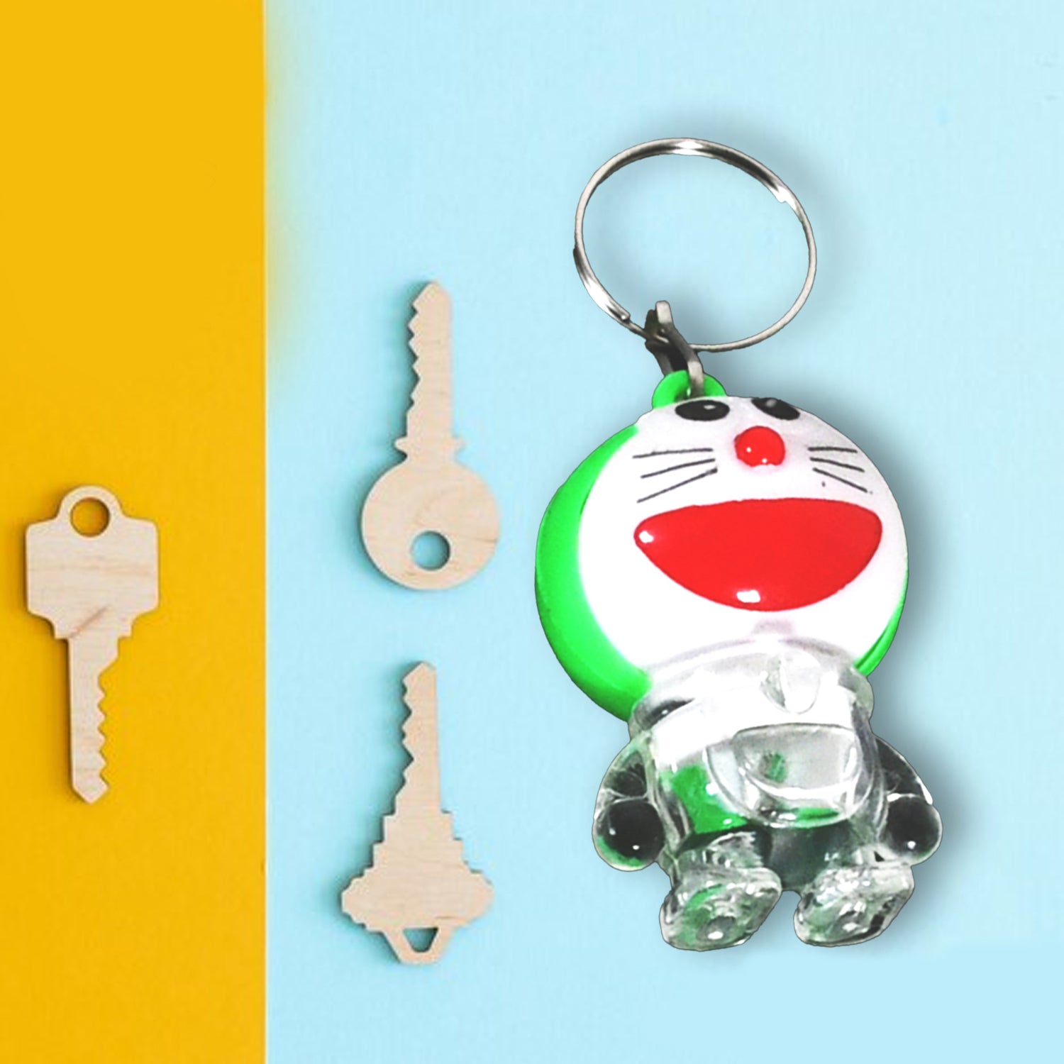 Doremon keychain held in hand, showing its compact size and vibrant look.
