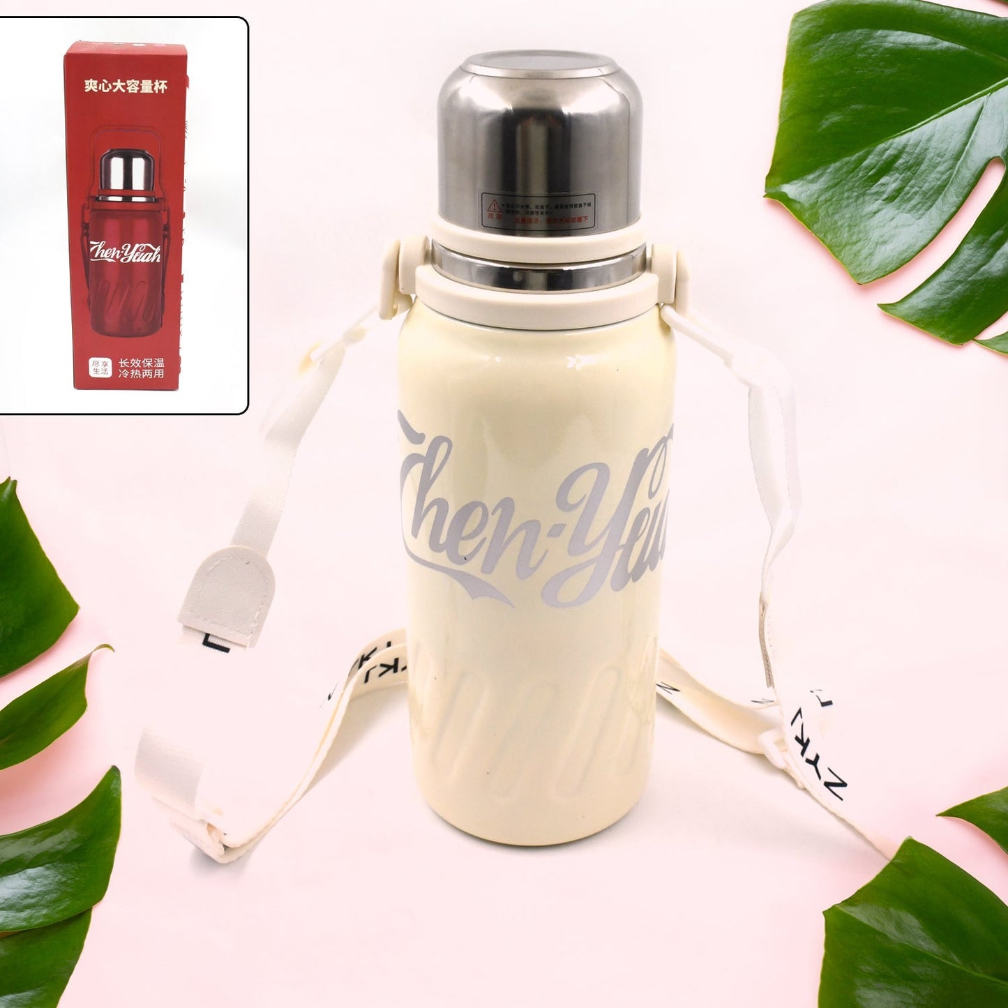 Lifestyle image of the sleek stainless steel water bottle on a clean background.