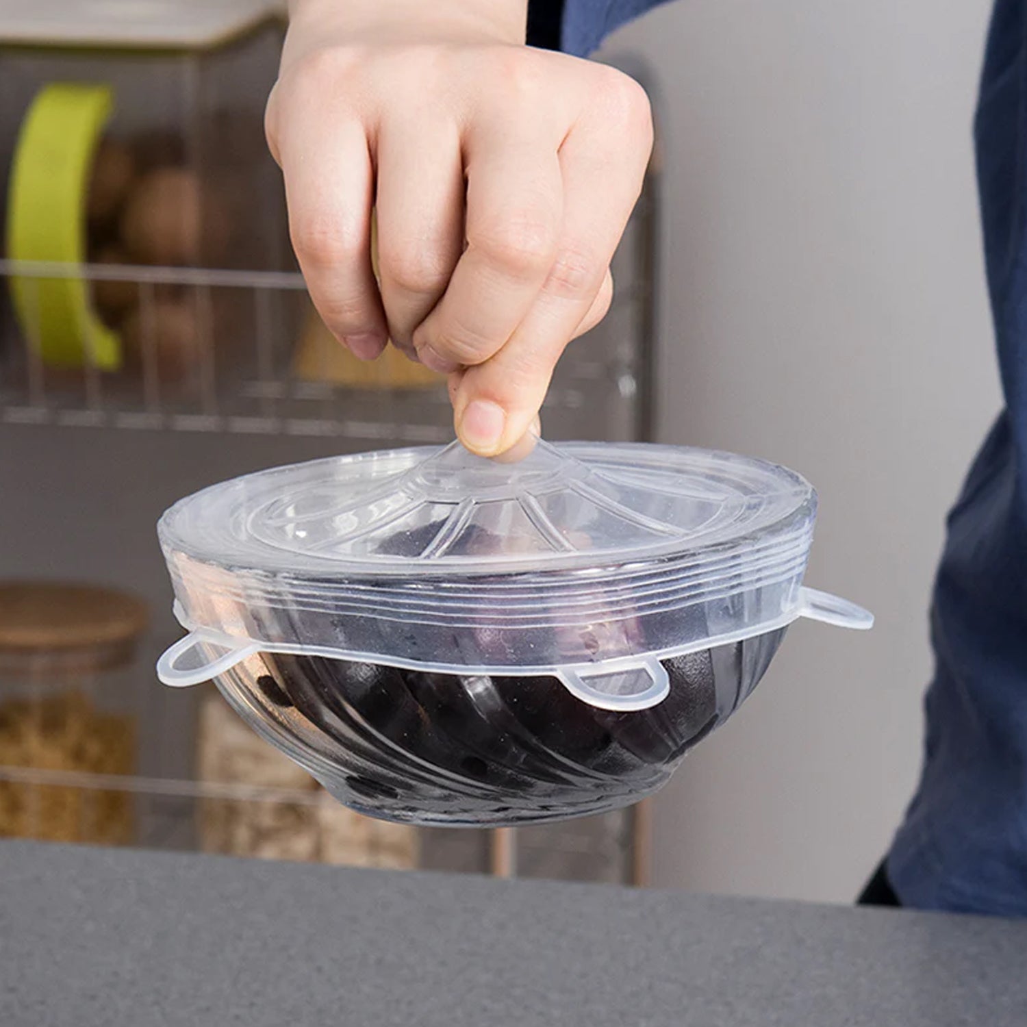 Silicone stretchable food covers sealing fresh food in bowls