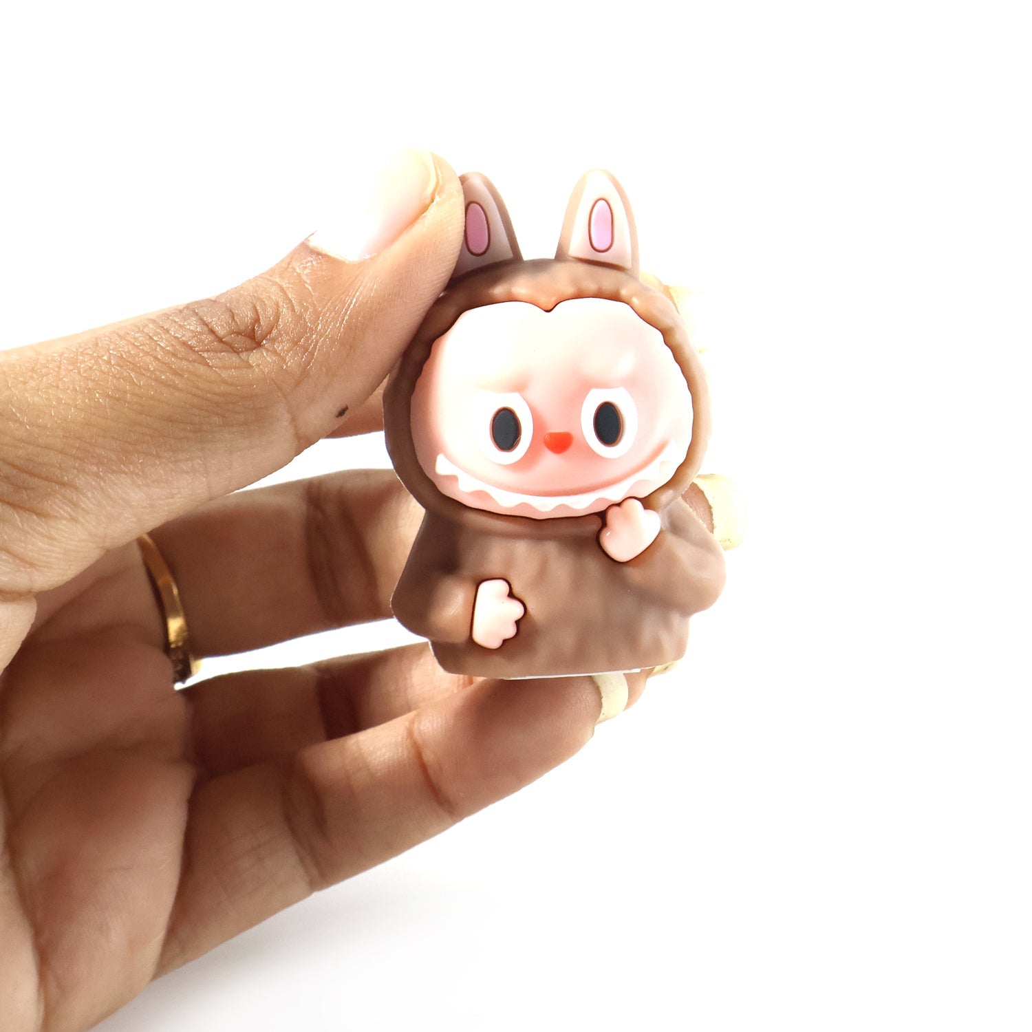 Cartoon dinosaur themed eraser with integrated pencil sharpener