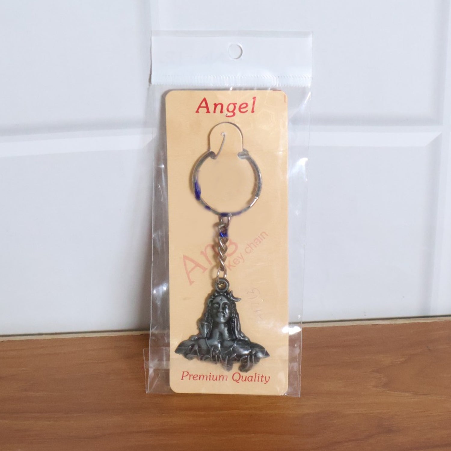 Detailed view of Shiva Face on durable metal keychain