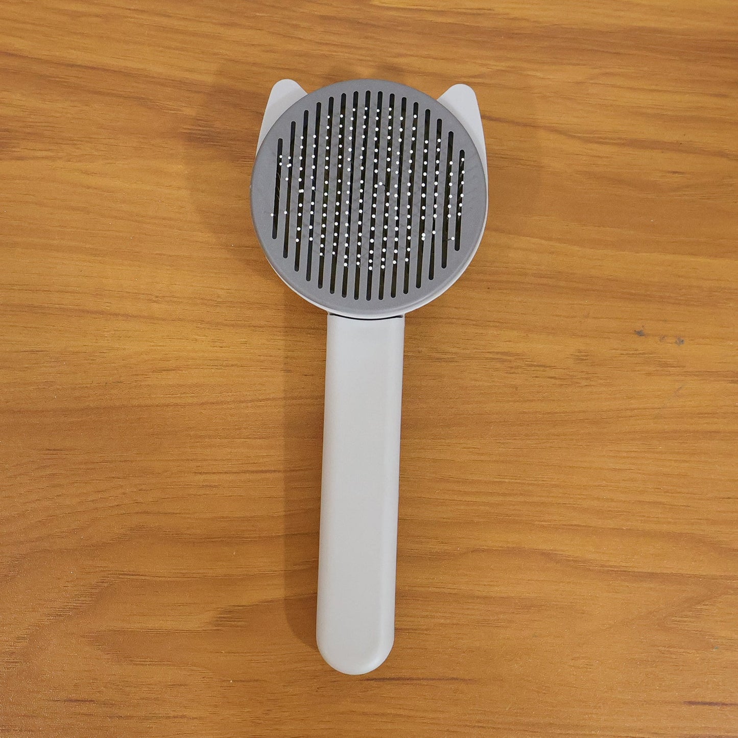 Reusable pet shedding needle comb suitable for dogs and cats
