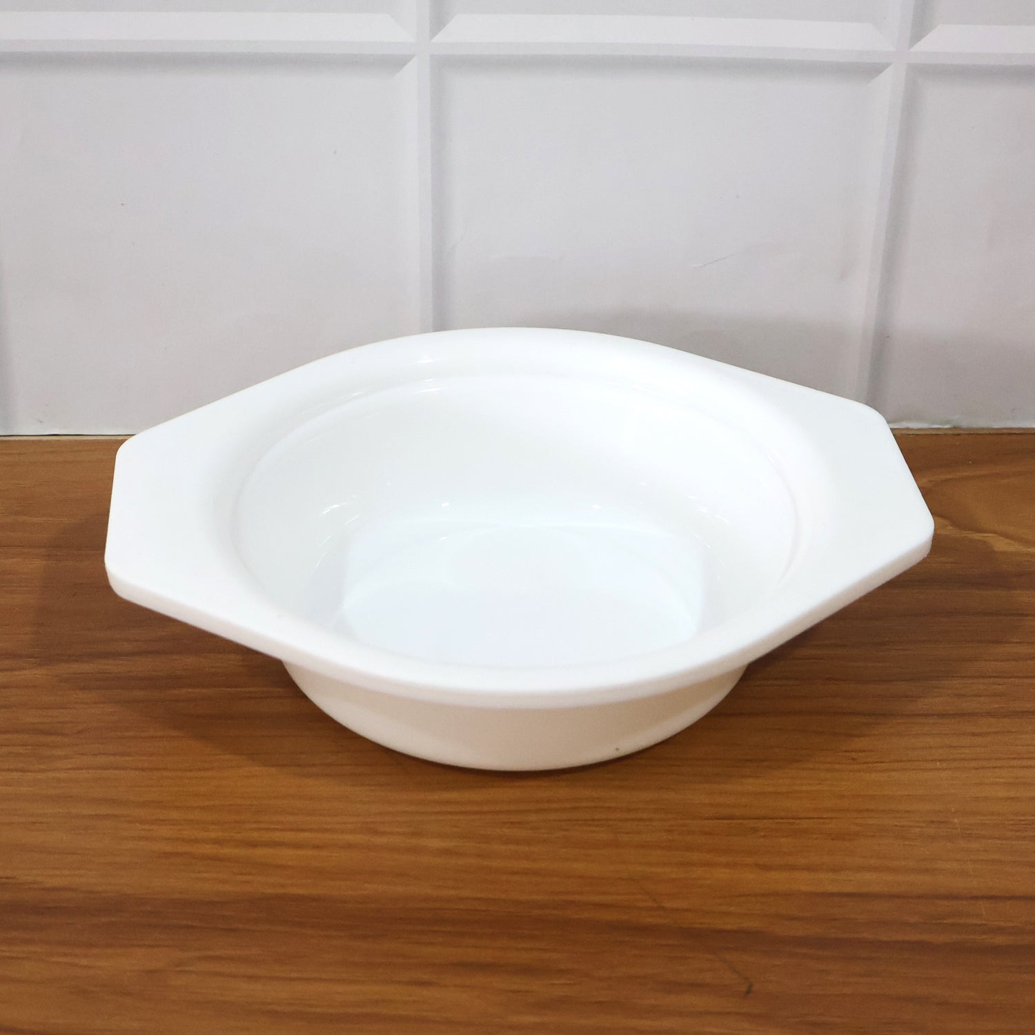 Plastic kitchen mixing bowl with modern neutral design and side tabs