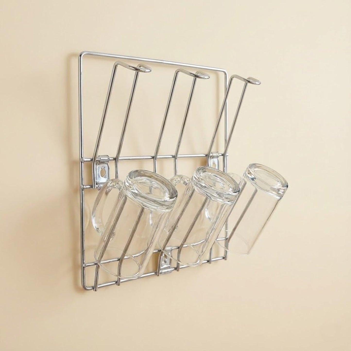 Wall-mounted stainless steel cup rack holding multiple drinkware
