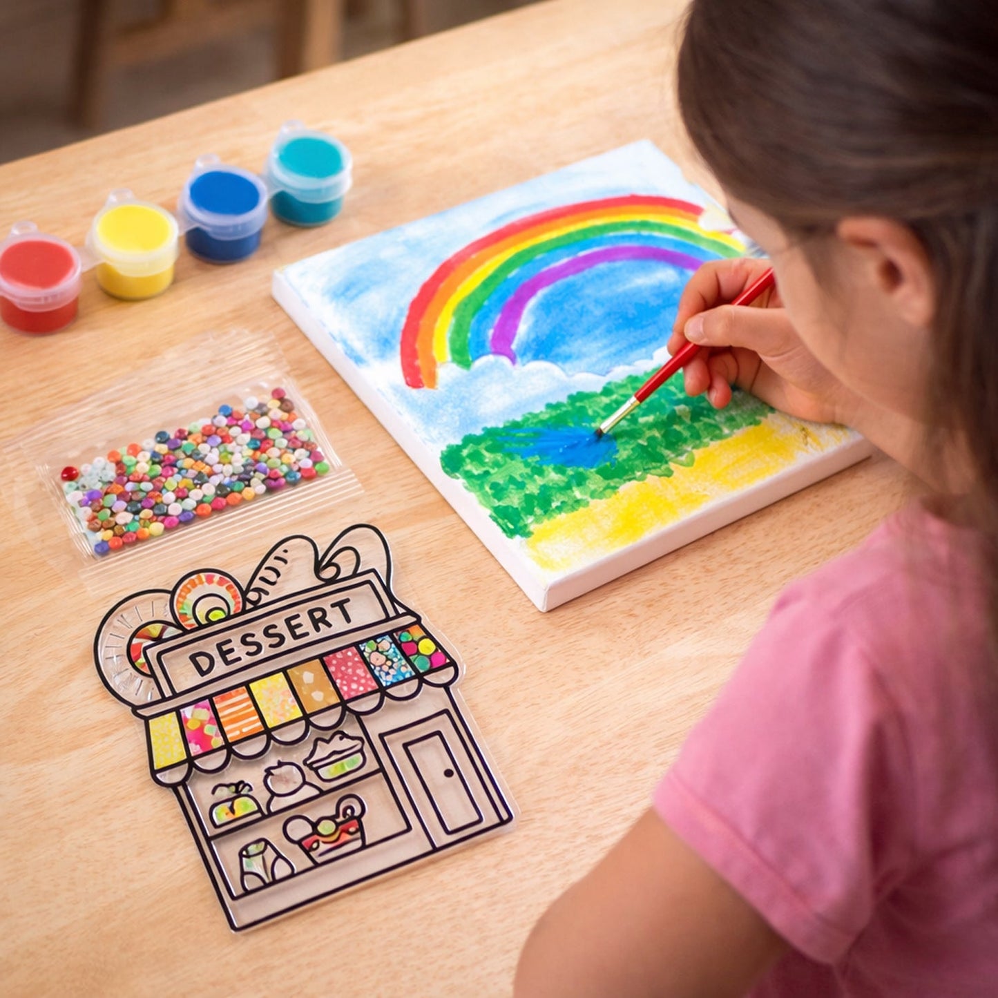 Learning craft kit for children with paint, brush, and beads