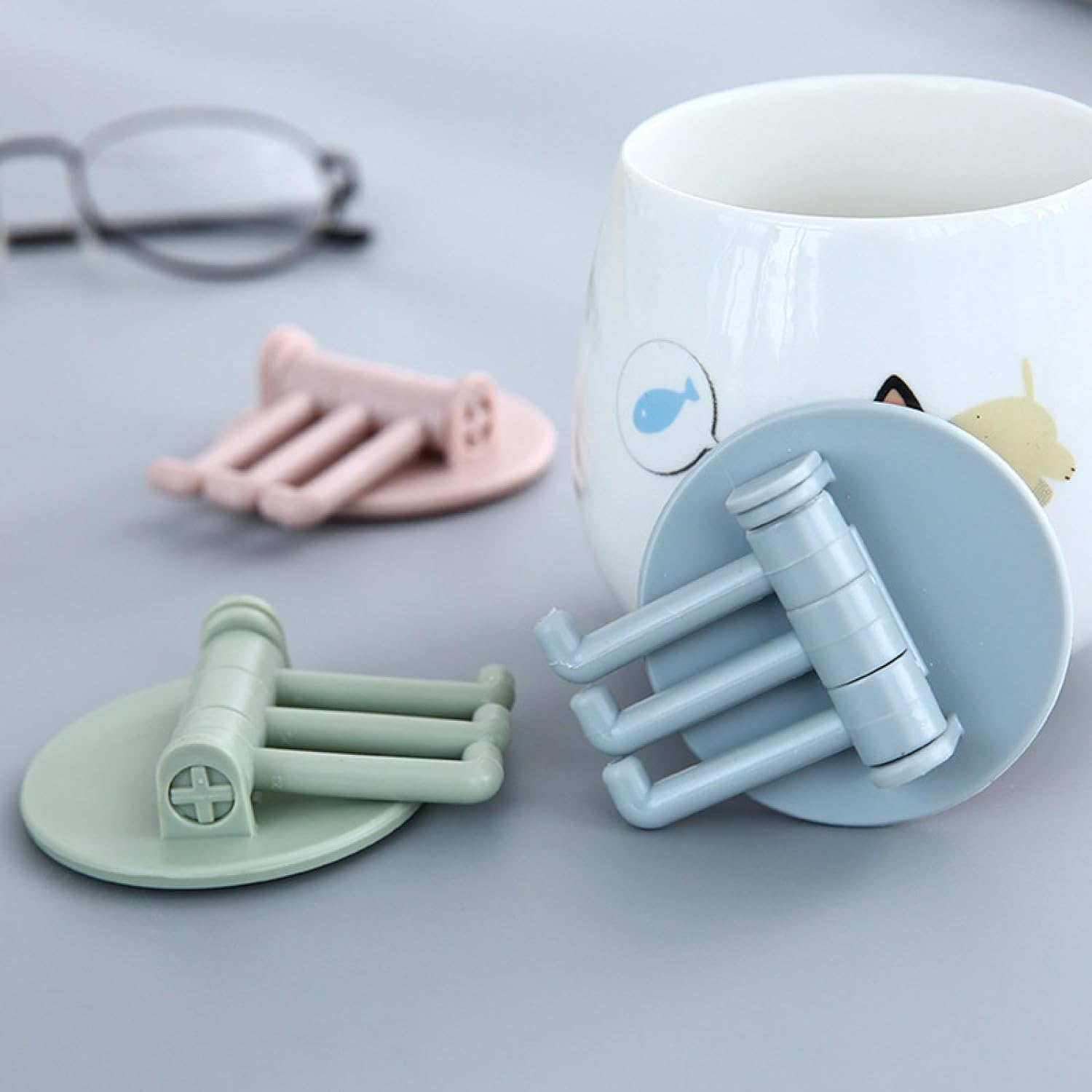 Rotatable sticky hook mounted on a wall, ready to organize various home spaces efficiently.