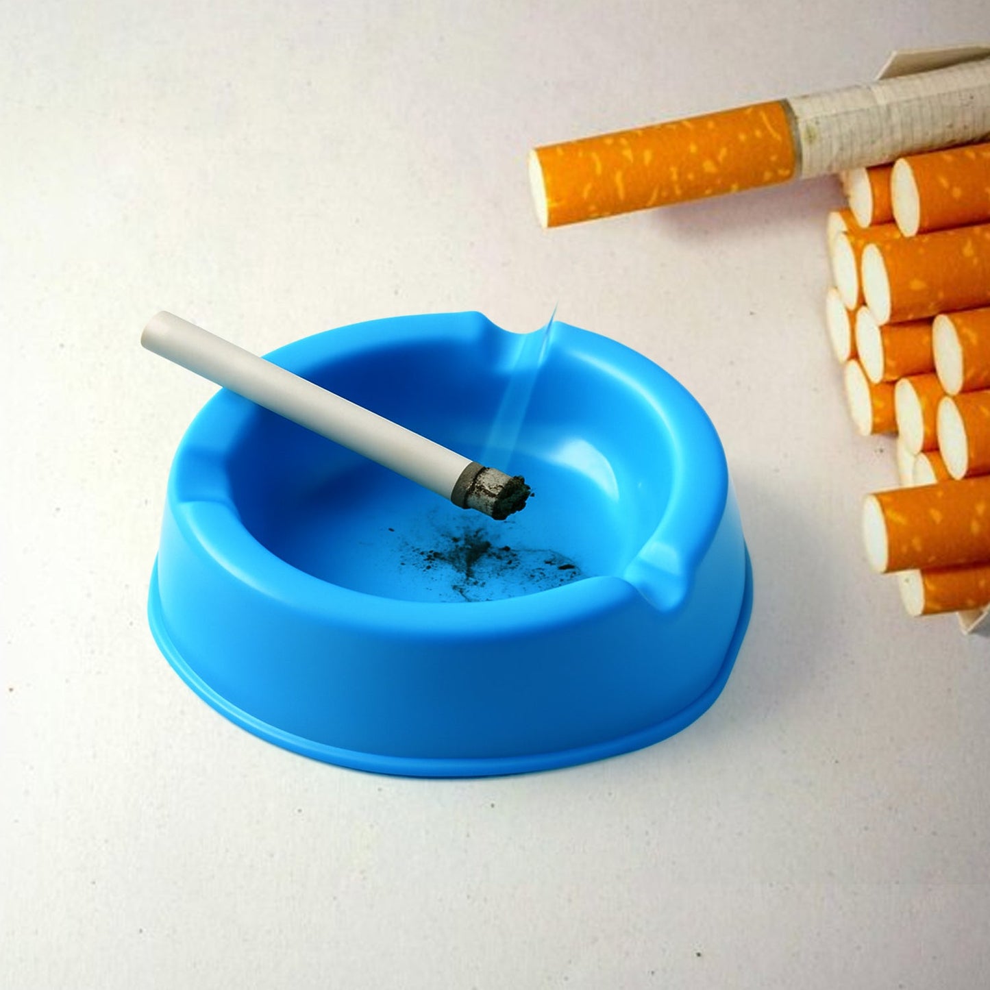 Tough plastic ashtray by Oblivion with multiple cigarette slots and heat resistance