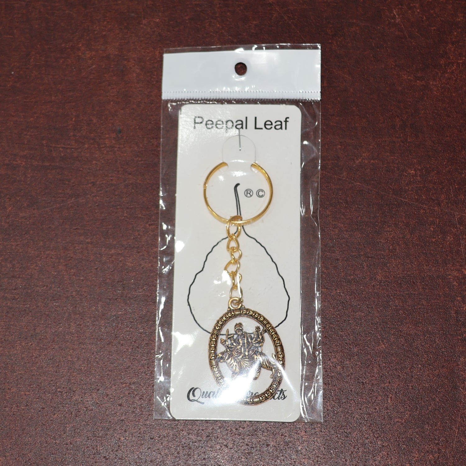 Maa Durga Golden Keychain packaged in Peepal Leaf blister pack