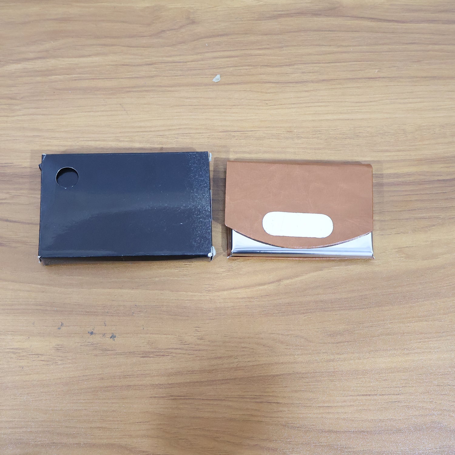 Premium leather business card holder displayed on office desk