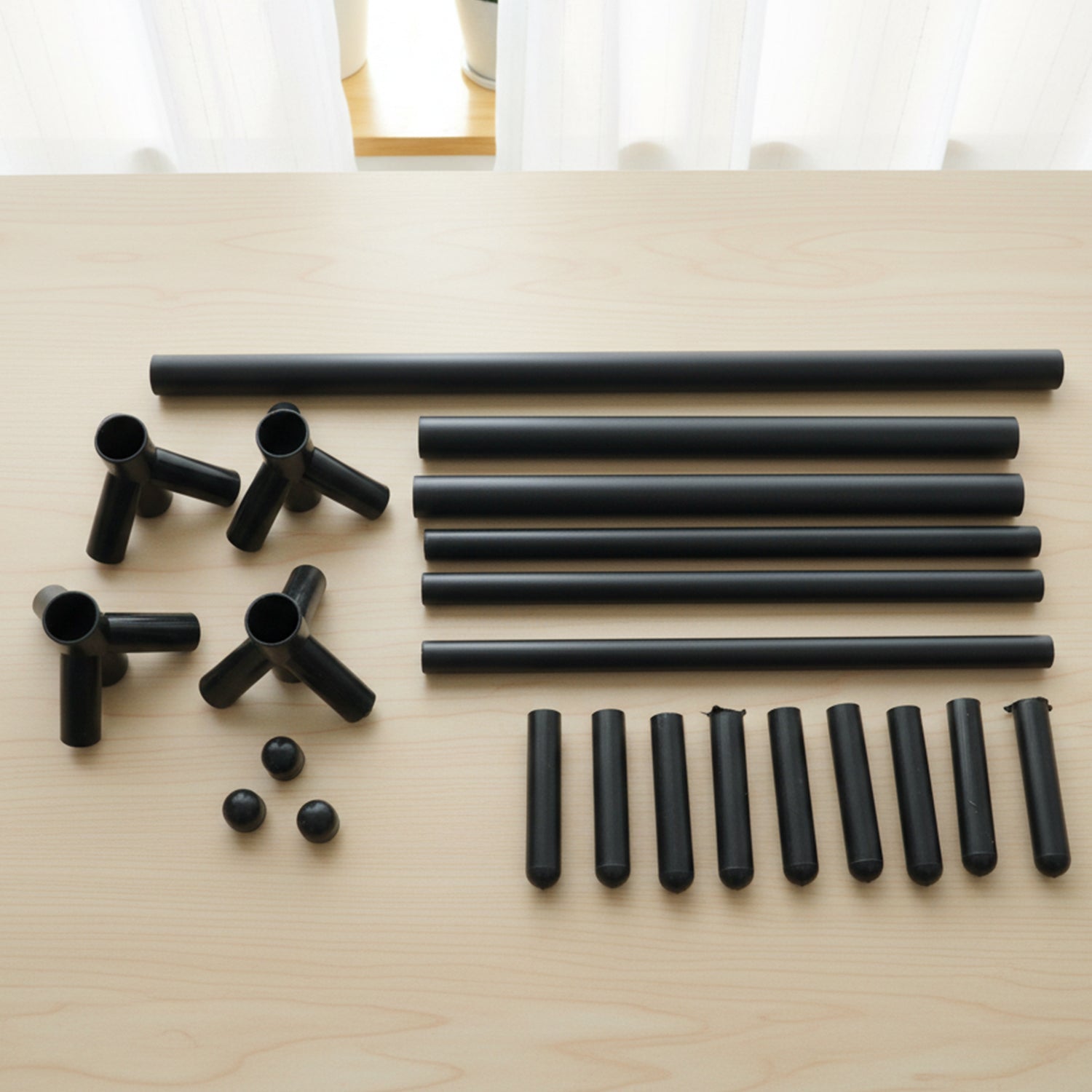 Modern metal coat rack stand freestanding in entryway corner