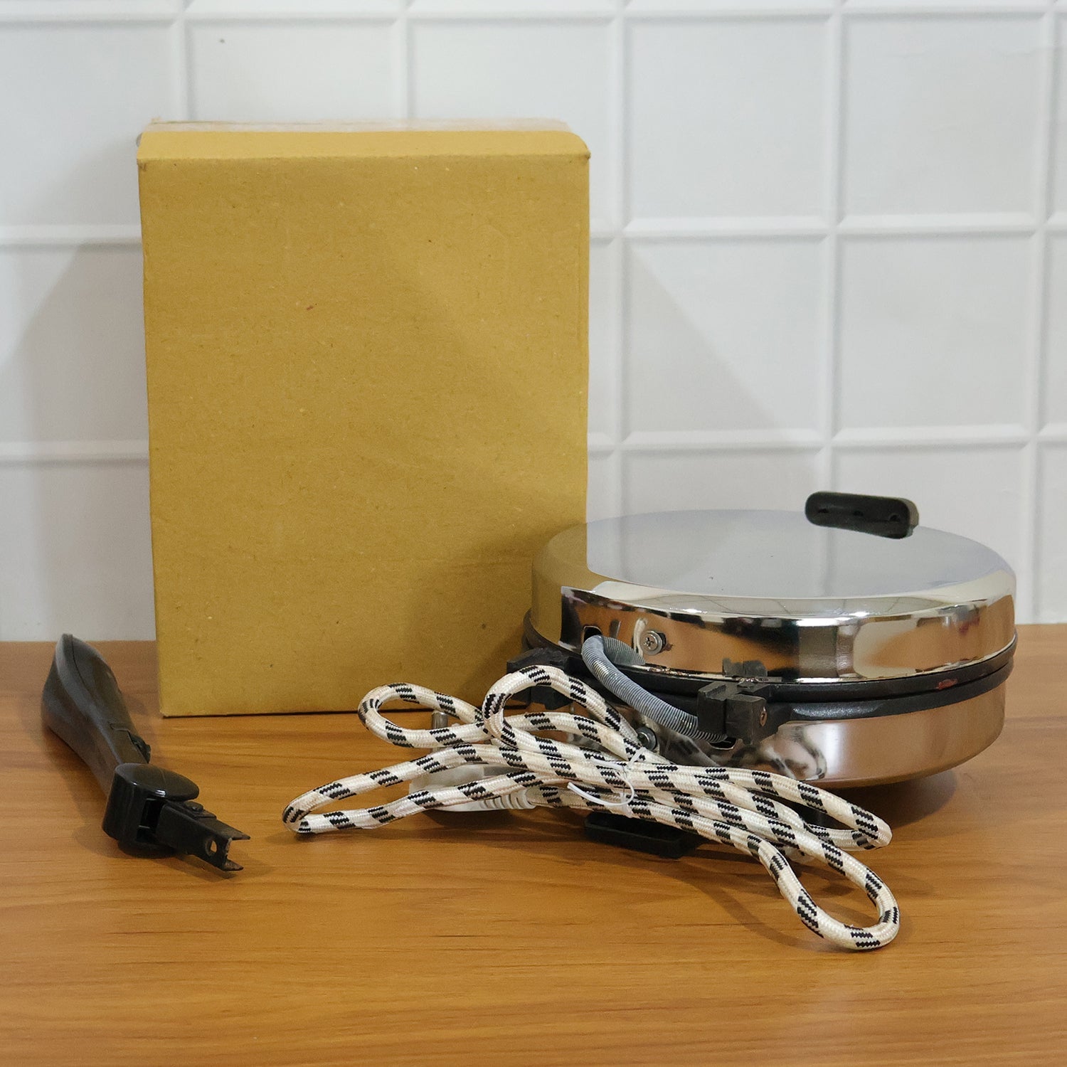 Comparison shot highlighting features of  electric roti maker
