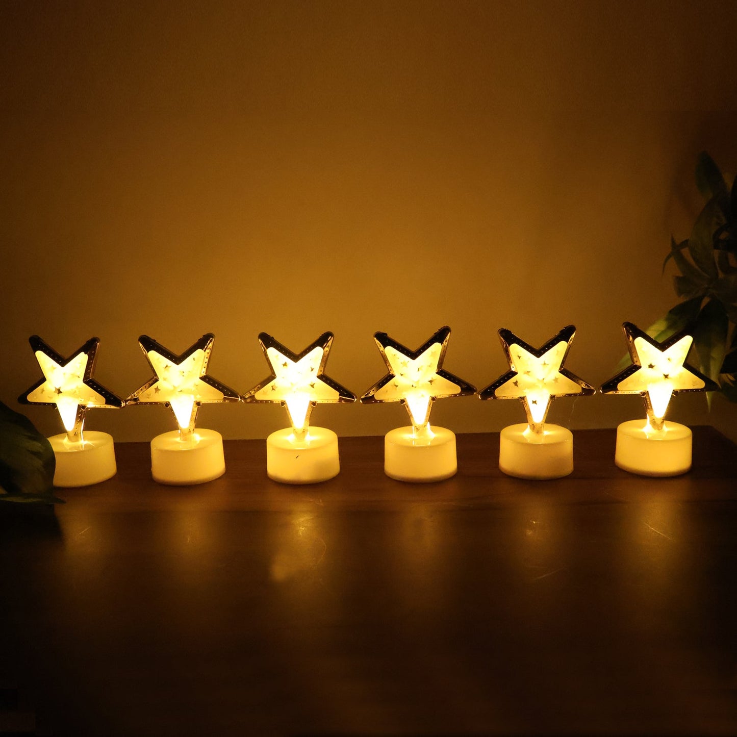 Battery operated star shaped LED candle with easy on/off switch at base