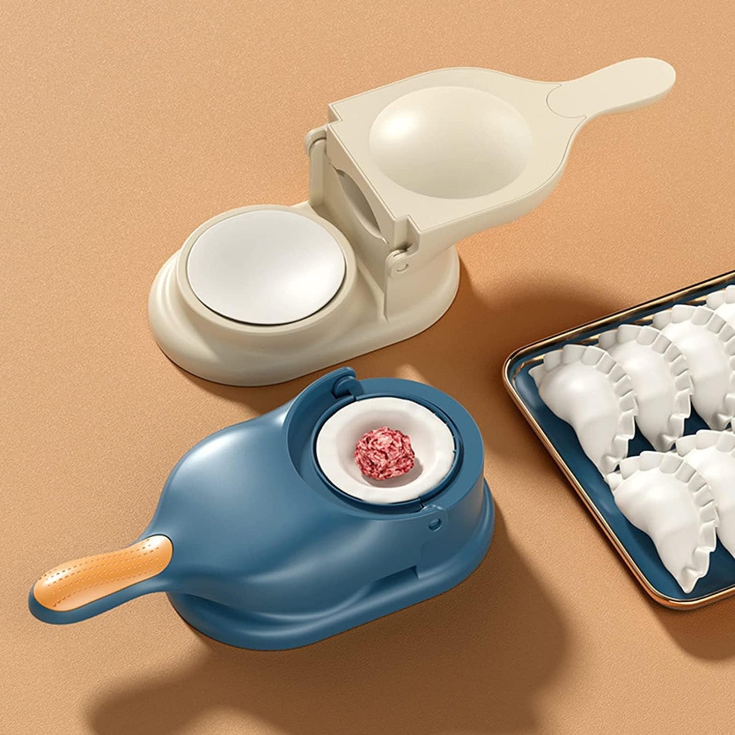 The complete 2-in-1 kitchen dumpling maker tool, ready for use on a clean surface.