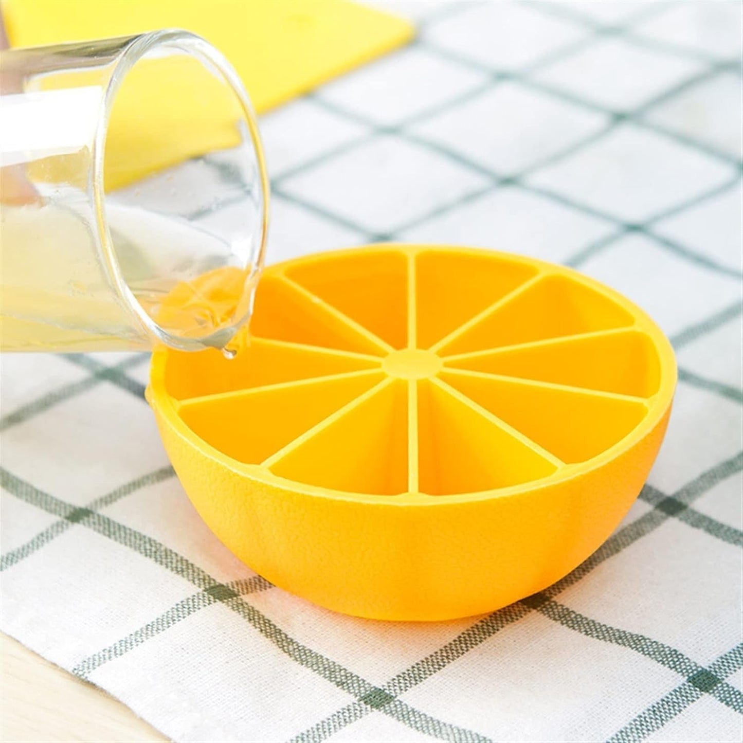 ChillPour bright green flexible lemon-shaped silicone ice cube tray in kitchen